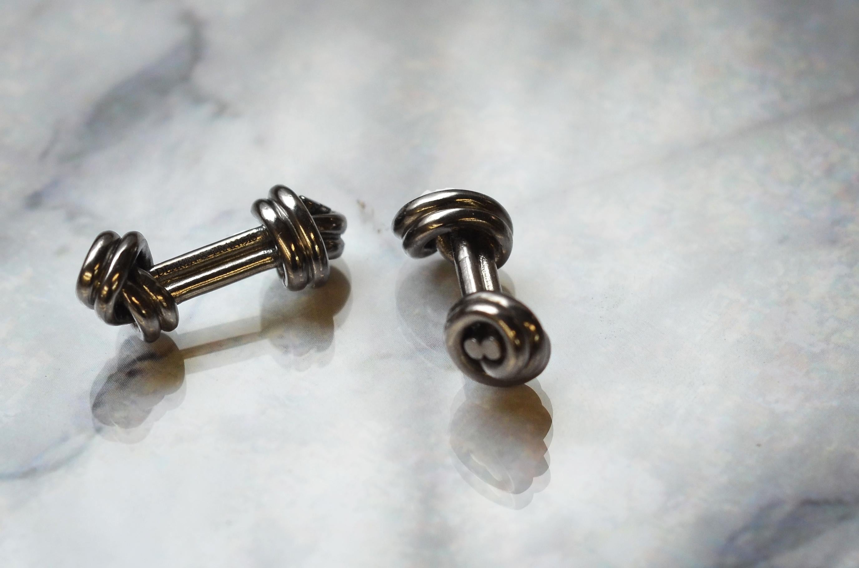 DEAKIN & FRANCIS, Piccadilly Arcade, London

Don't get yourself in knots over your cufflinks, choose these edgy dark grey double knot cufflinks for the ultimate stylish look. With interwoven knots on a bar, this design that is made to last a life