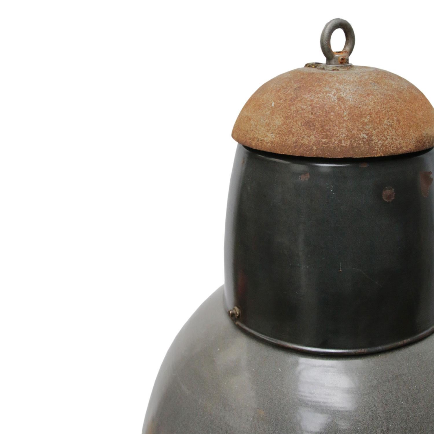 Grey enamel industrial pendant. Nicely aged coloring in patina.
White interior.

Weight: 7.5 kg / 16.5 lb.

Priced per individual item. All lamps have been made suitable by international standards for incandescent light bulbs, energy-efficient and