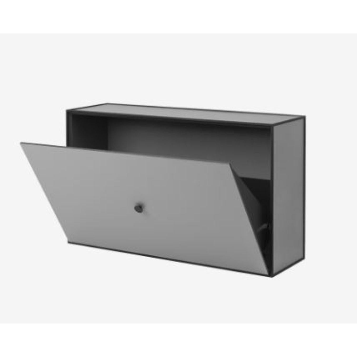 Dark grey frame shoe cabinet by Lassen
Dimensions: D 70 x W 21 x H 42 cm 
Materials: finér, melamin, melamine, metal, veneer
Also available in different colours and dimensions. 
Weight: 20 Kg

By Lassen is a Danish design brand focused on
