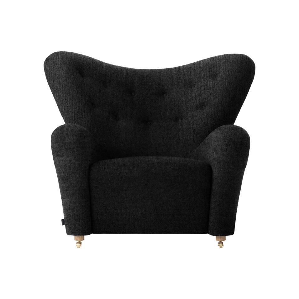 Dark grey Hallingdal the tired man lounge chair by Lassen
Dimensions: W 102 x D 87 x H 88 cm 
Materials: Sheepskin

Flemming Lassen designed the overstuffed easy chair, The Tired Man, for The Copenhagen Cabinetmakers’ Guild Competition in 1935.