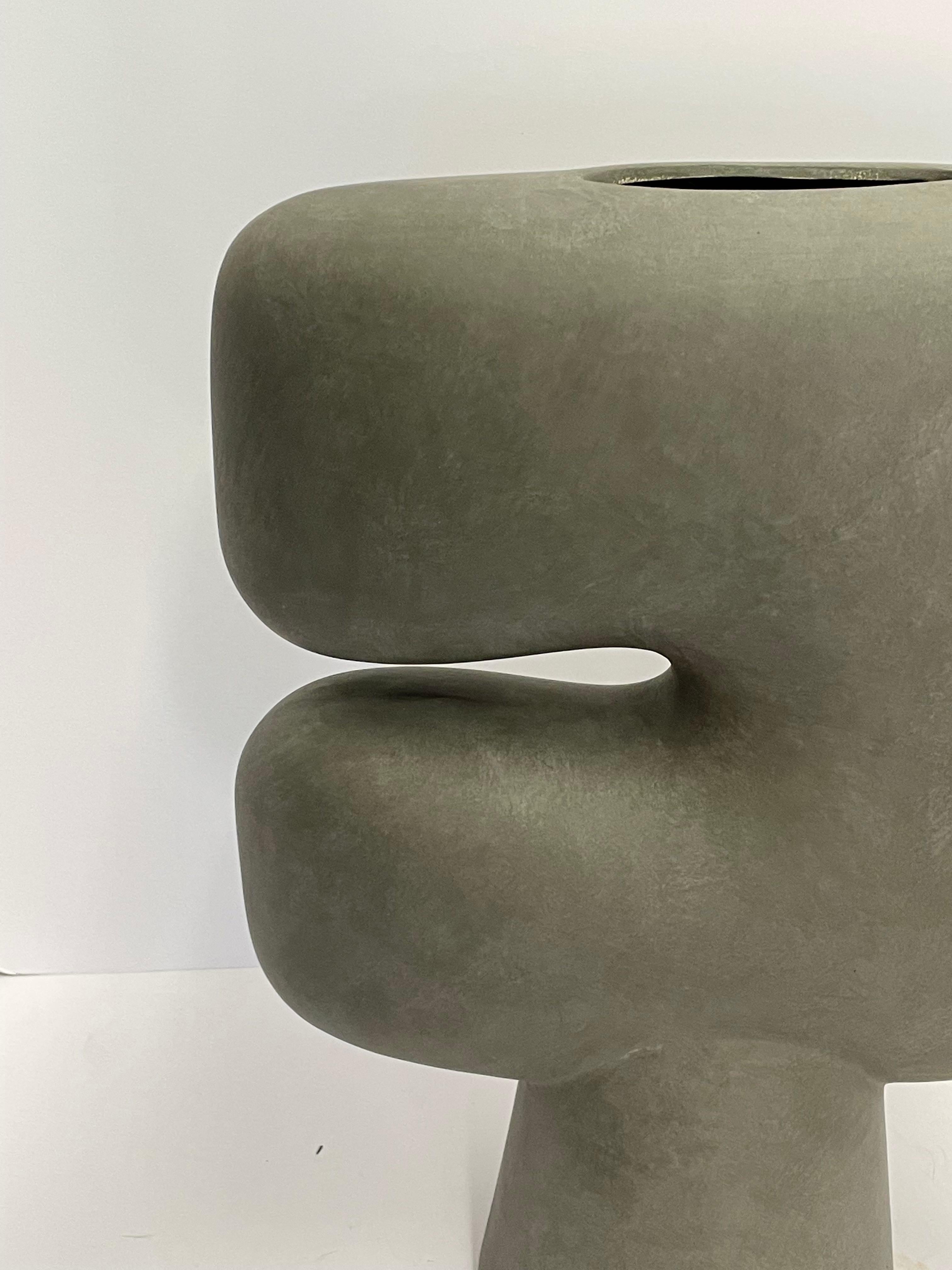 Contemporary Danish designed large C shape dark grey matte finish vase.
Tubular shaped base and spout.
