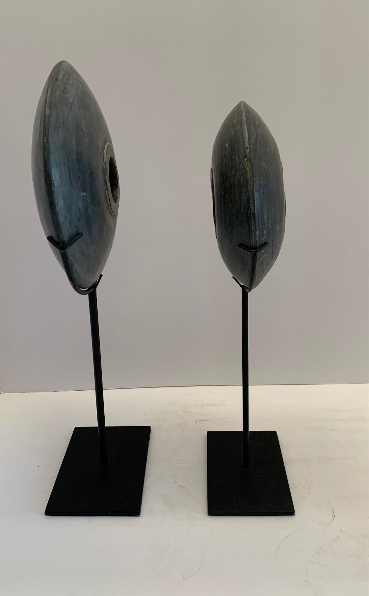 Contemporary Chinese set of two dark grey colored megalith discs on stands.
Smooth finish.
One disc measures  7