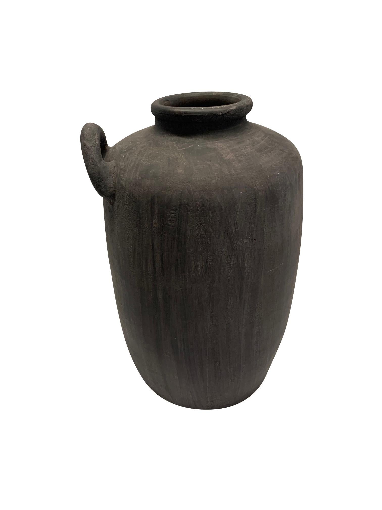 Contemporary Chinese vase with cement ( dark grey ) colored glaze having a weathered appearance.
Single handle.
 