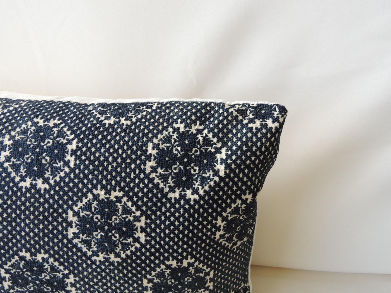 Embroidery fez antique textile bolster pillow.
Dark indigo embroidery large fez bolster pillow with natural linen frame and backing. Pillow handmade and designed in the USA. Closure by stitch (no zipper) with custom made pillow insert.
Ideal for a
