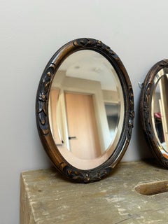 Juego de 2 Espejos de Pared Ovalados de Chinoiserie tallados en madera lacada oscura, 1920