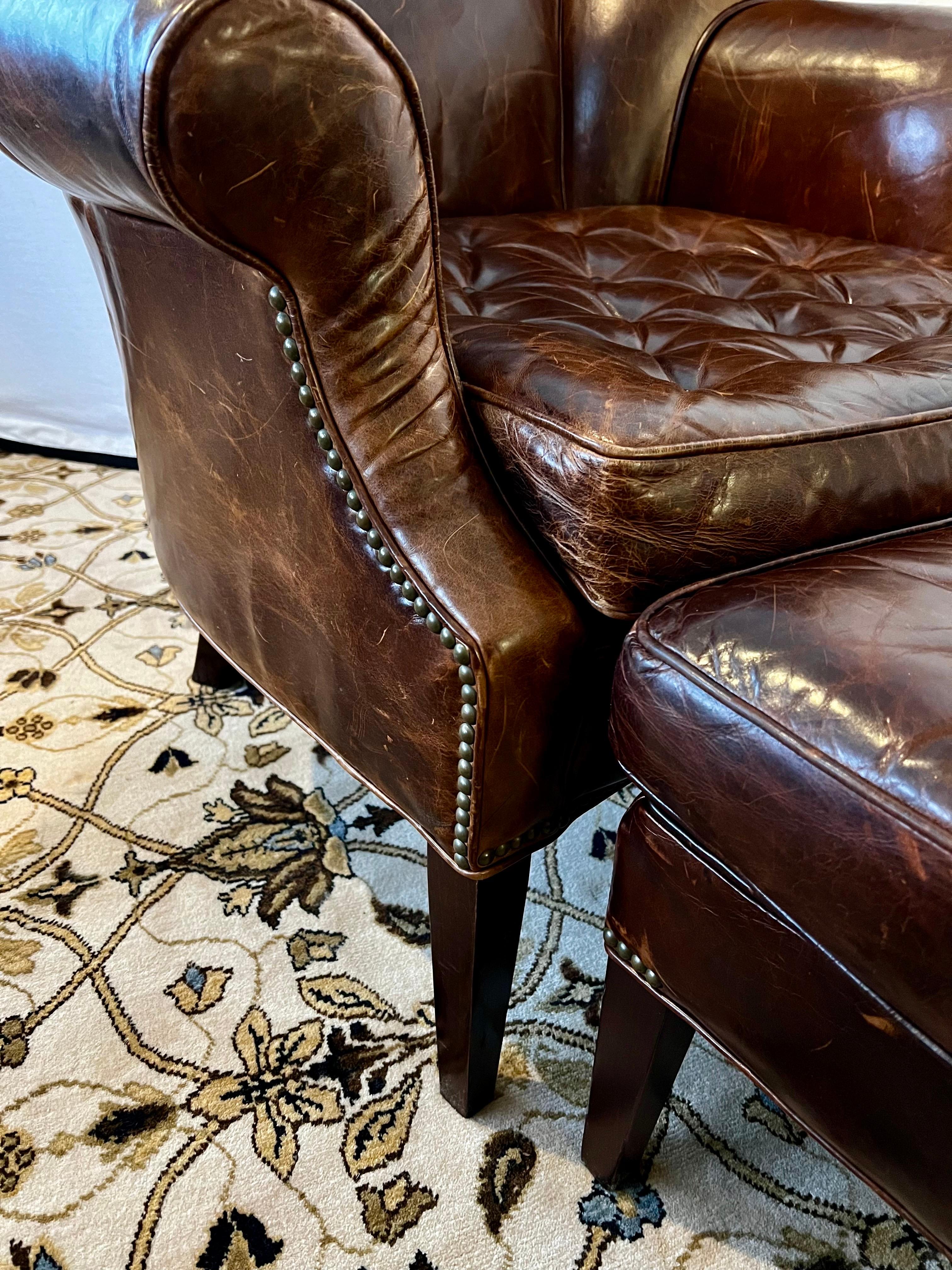 20th Century Dark Leather Wingback Chesterfield Tufted Chair and Ottoman Combo Great Patina For Sale