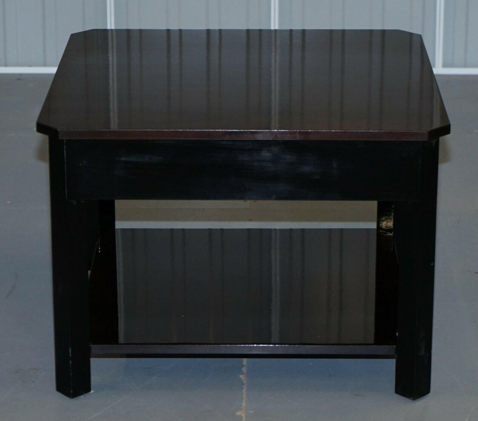 We are delighted to offer for sale this new ex display lovely deep dark Mahogany Bevan Funnell coffee table

This was bought as an ex display piece directly from the Bevan Funnell warehouse, it is new never used however has some light transport
