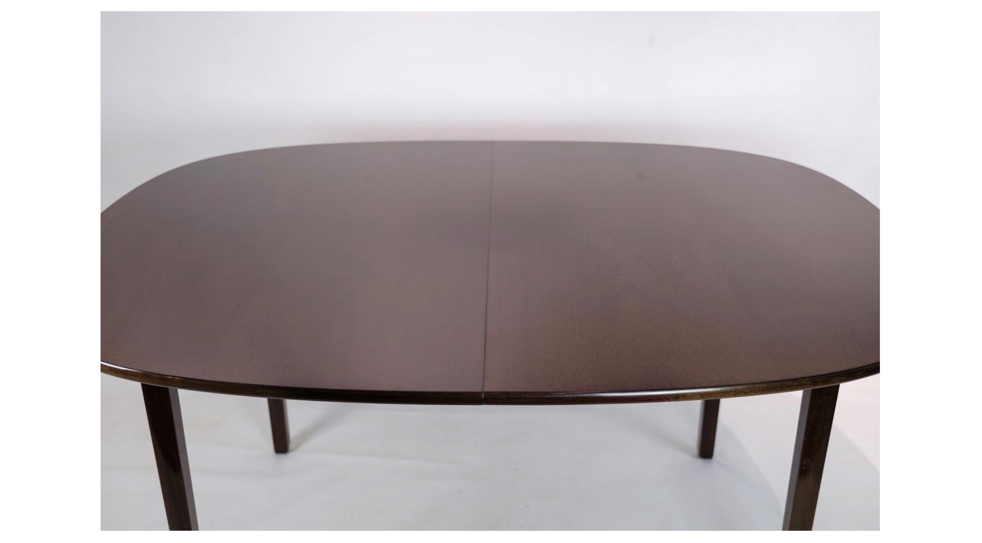Danish Dining Table Made In Dark Mahogany Designed By Ole Wancher Made by P. Jeppesen For Sale
