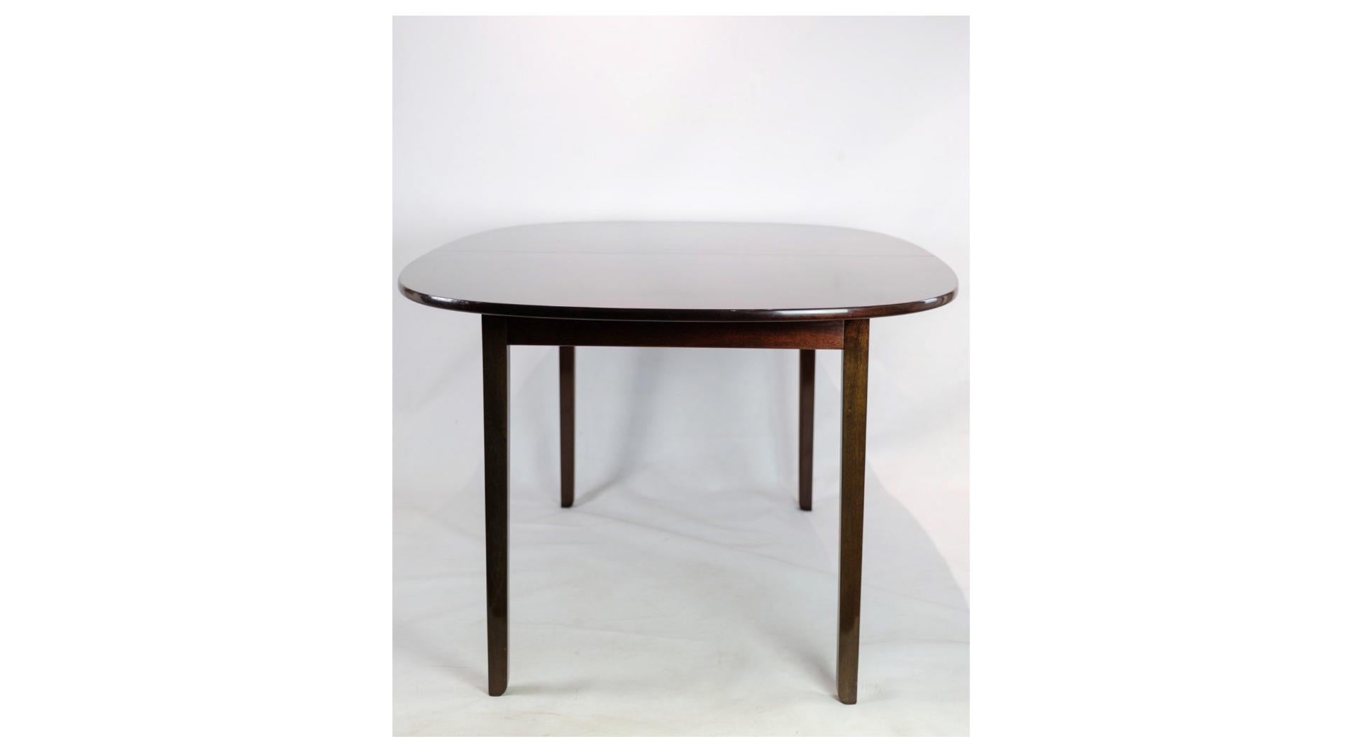 Mid-20th Century Dining Table Made In Dark Mahogany Designed By Ole Wancher Made by P. Jeppesen For Sale