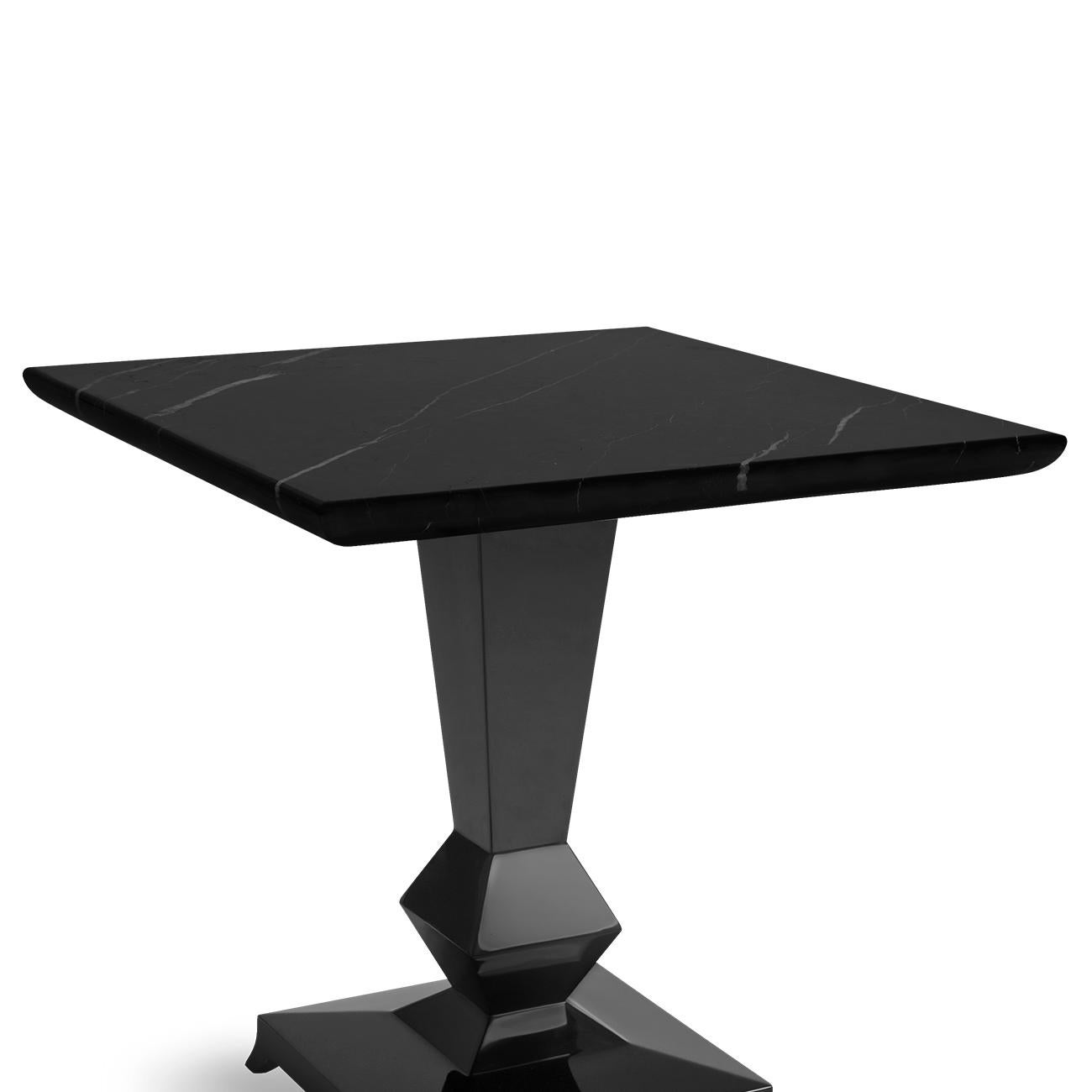 Side table dark marble with solid mahogany
wood base in black lacquered finish. With soli
black marble top Nero Marquina.