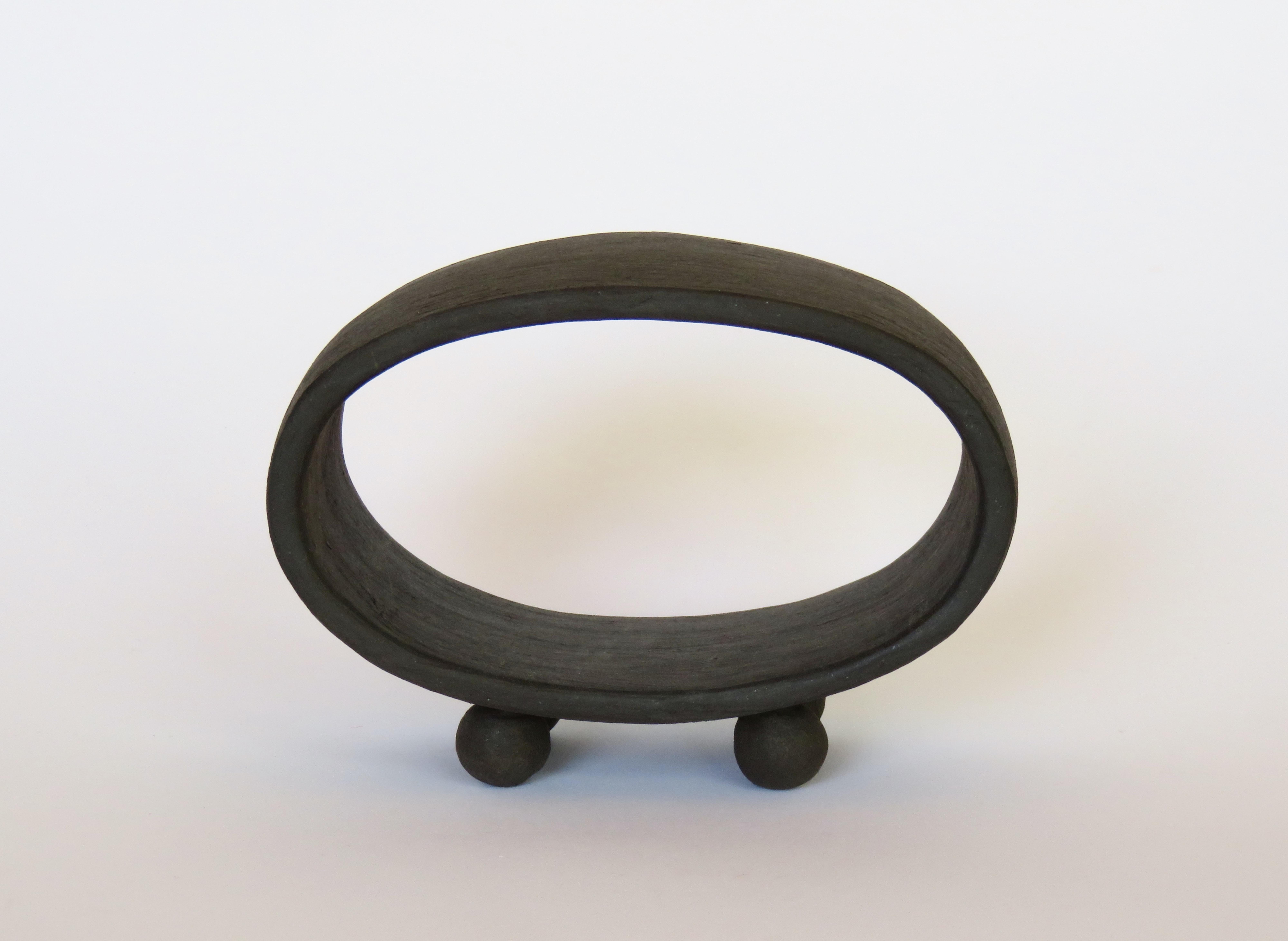 American Dark Matte Brown Ceramic Sculpture, Hollow Oval on 4 Button Feet, Hand Built For Sale