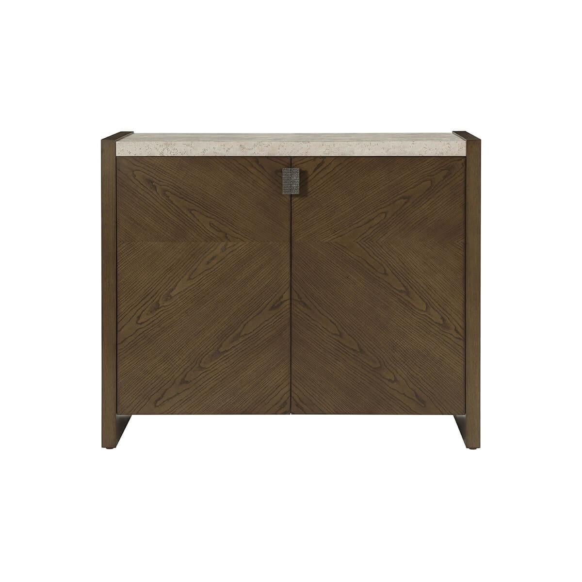 A the two-door cabinet with cathedral ash in our darker earth finish. Completed with textured metal pulls in our new Ember finish and a stone-like porous top in our exclusive Mineral finish. Includes an adjustable shelf.
Dimensions: 46