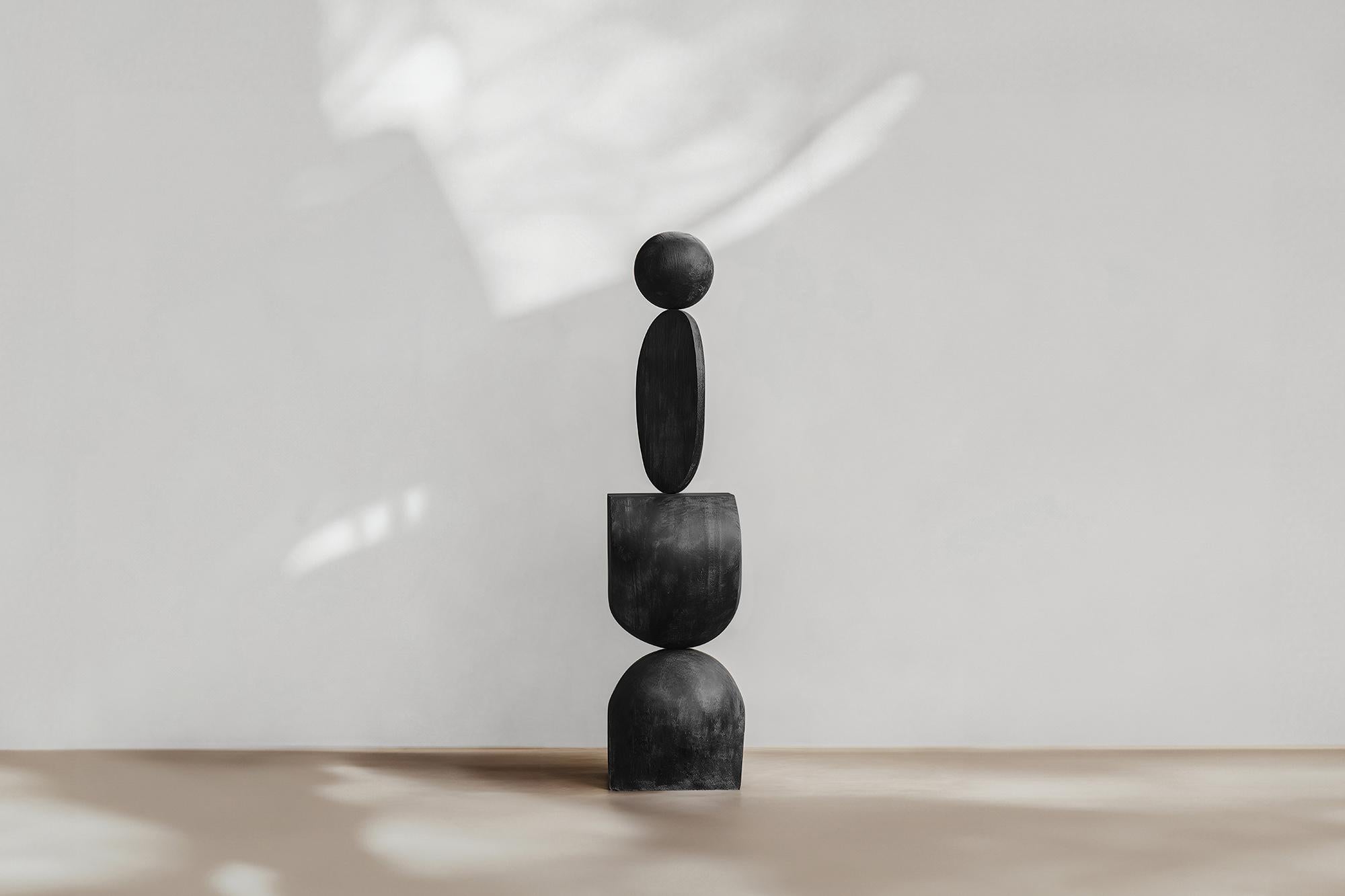 Dark Modern Totem, Black Solid Wood, Vision by Escalona, Still Stand No81——


Joel Escalona's wooden standing sculptures are objects of raw beauty and serene grace. Each one is a testament to the power of the material, with smooth curves that flow