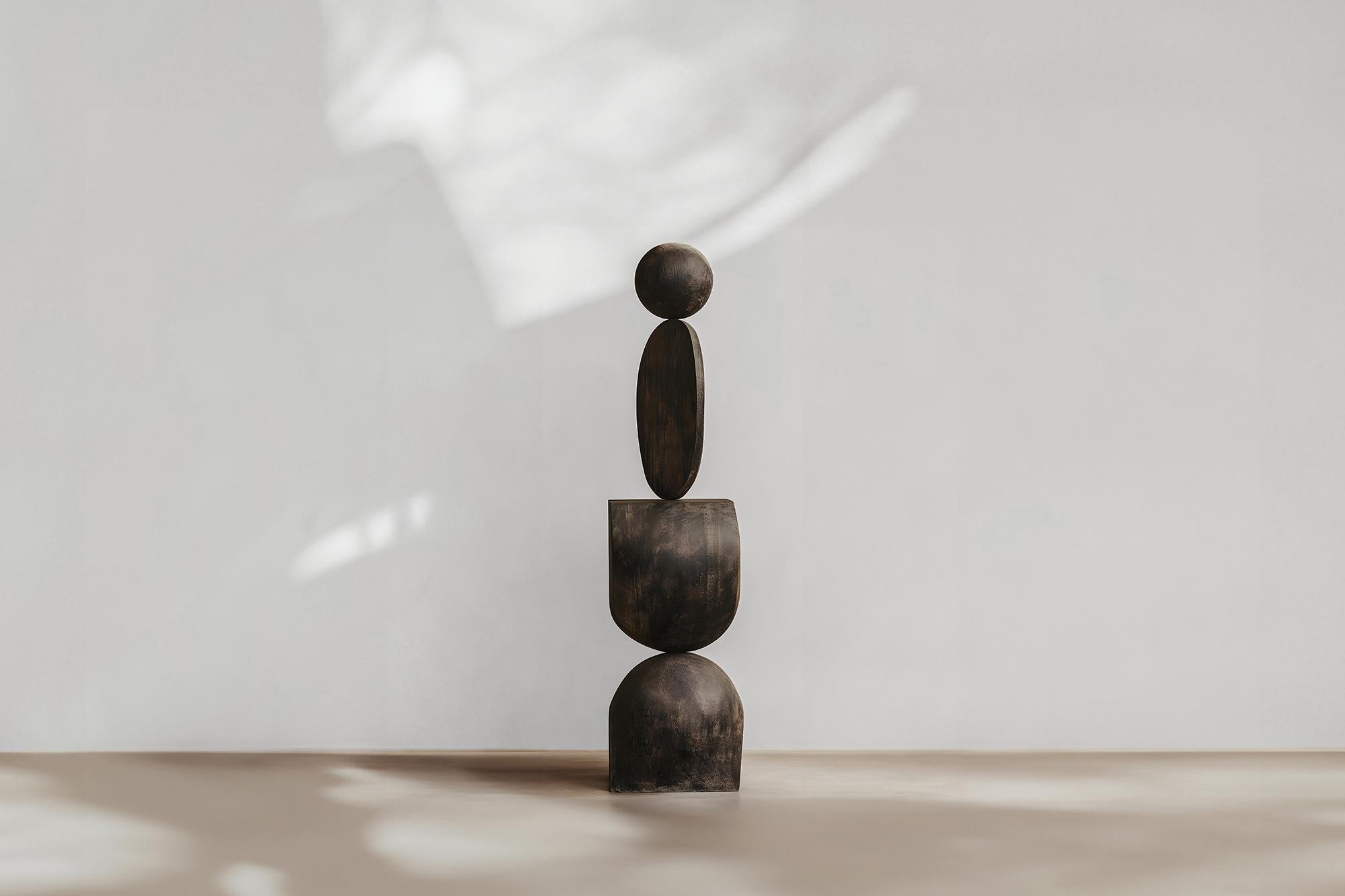 Dark, Modern Totem in Burned Oak, Escalona's Vision, Still Stand No81

——


Joel Escalona's wooden standing sculptures are objects of raw beauty and serene grace. Each one is a testament to the power of the material, with smooth curves that flow