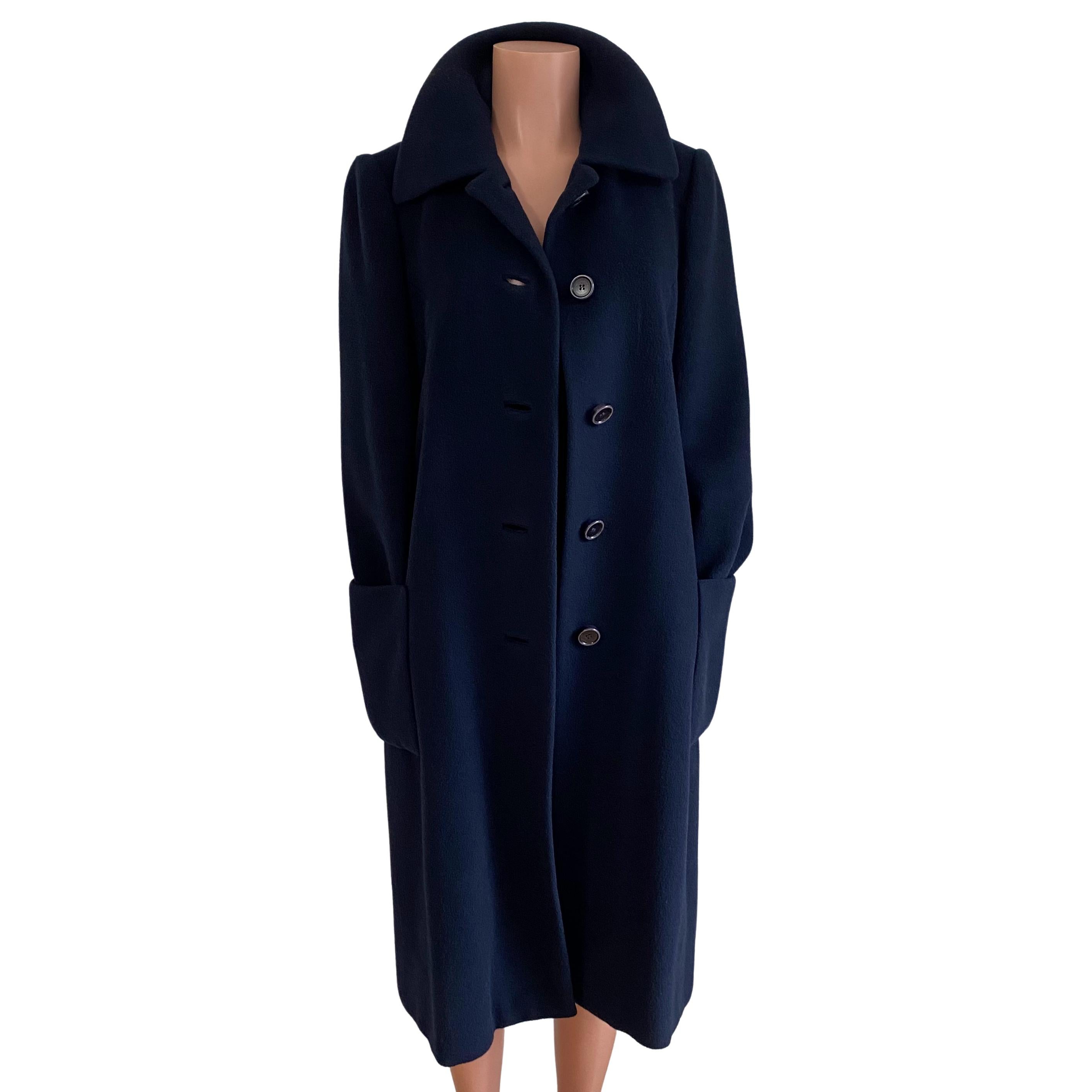 Impeccable classic, chic, timeless coat.
Color is DARK NAVY. Most images have been lightened to show details.
In thick, thick woven cashmere, lined.  
Everything about this coat is bon-chic-bon-genre.

Straight cut. Big tailored patch pockets.