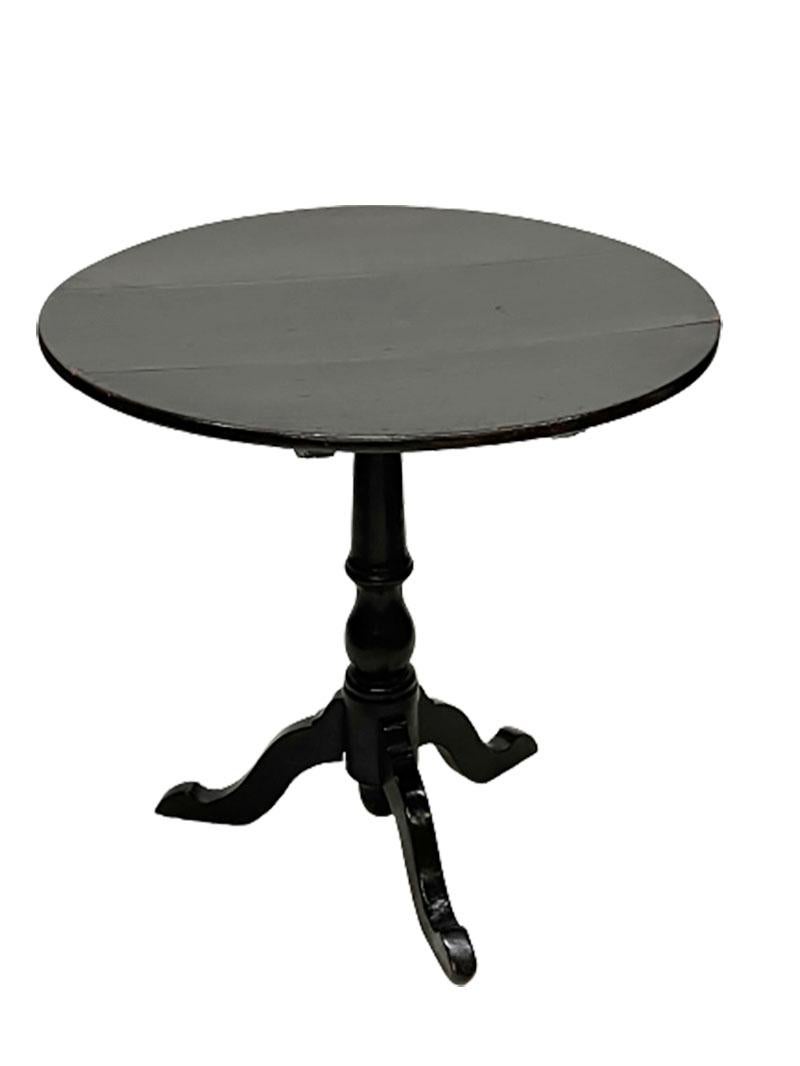 Dark oak 19th century tilt-top tripod table

A round beautiful with dark patina oak wooden tripod tilt-top table.
An early 19th century table and measures 69 cm diagonal.
The highest measurement when the table is up is 110 cm. The diagonal of