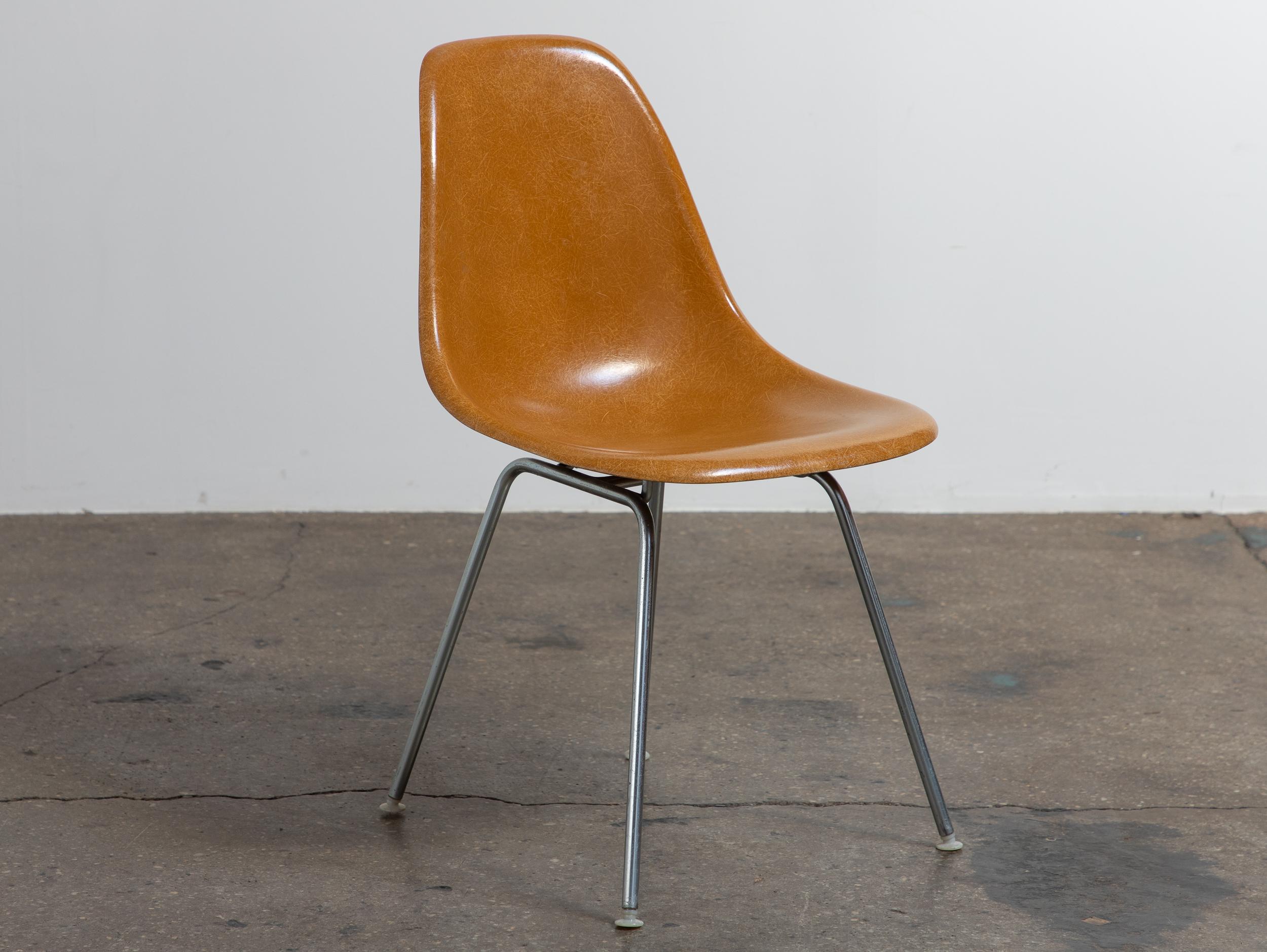 Multiple Available. Original Molded Fiberglass Shell Chair, designed by Charles and Ray Eames for Herman Miller. Vintage shell chairs are prized for their attractive patina, distinct thread texture and beautiful depth of color seen in the fiberglass