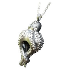 Dark octopus charm