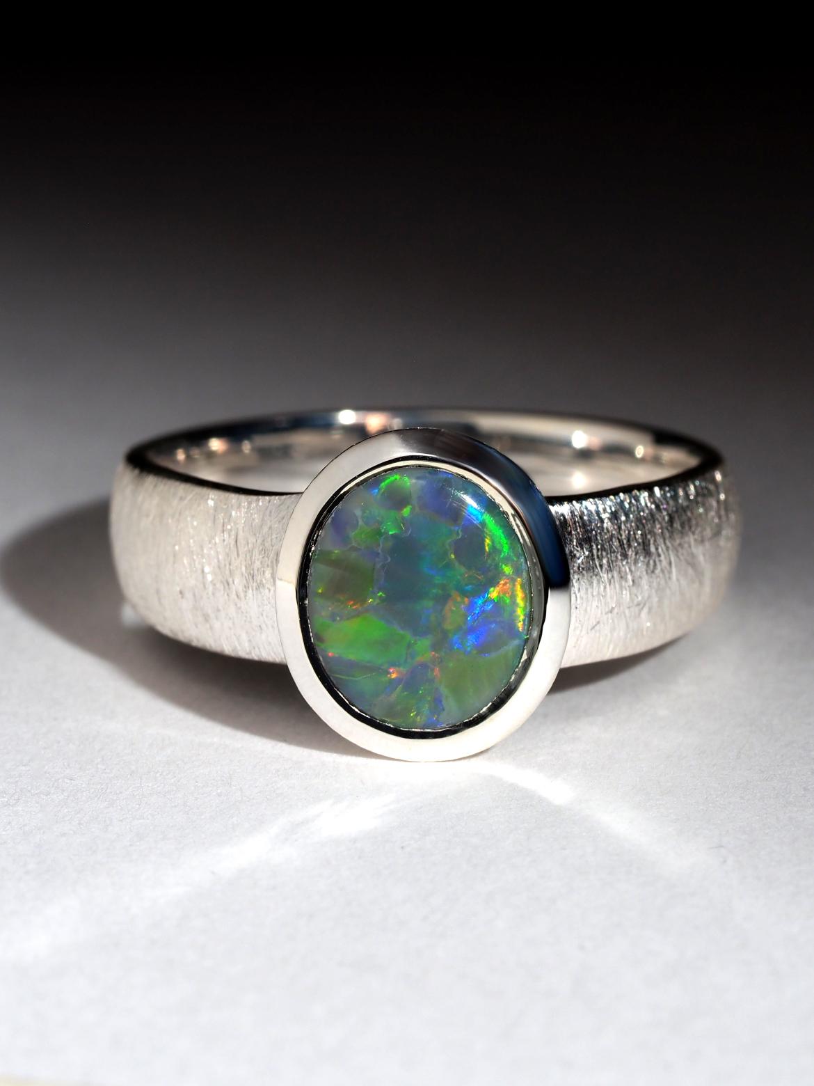 Silver ring with natural dark Opal
Opal gemstone origin - Australia
opal measurements  - 8 x 9.40 mm
weight of Opal 1.71 ct
ring weight - 4.9 grams
ring size - 8 1/2 US, diameter 18.5 mm, N 18, 58 circumference