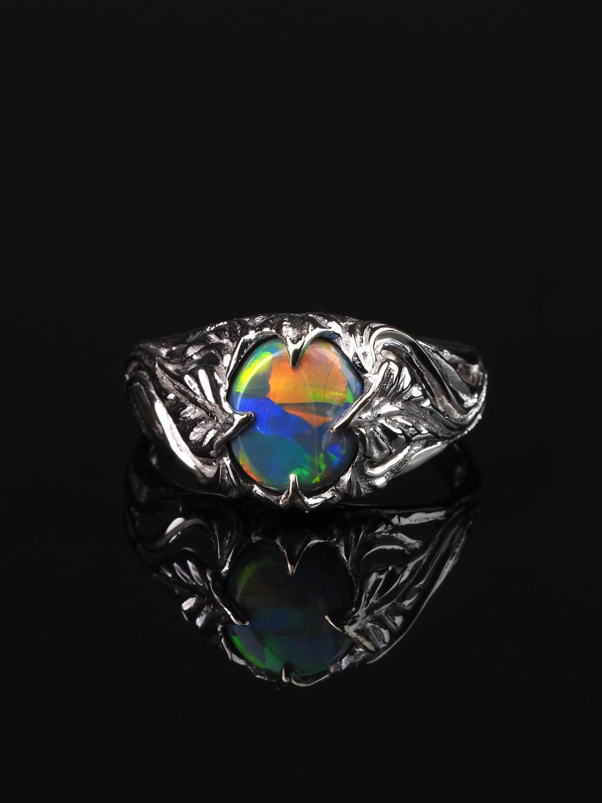 14K white gold ring with natural Dark Opal with bright opalescence 
opal origin - Australia
opal weight - 1.55 carats
stone measurements - 0.28 х 0.35 in / 7 х 9 mm
ring weight - 3.59 grams
ring size - 7 US (this ring may be resized, please contact