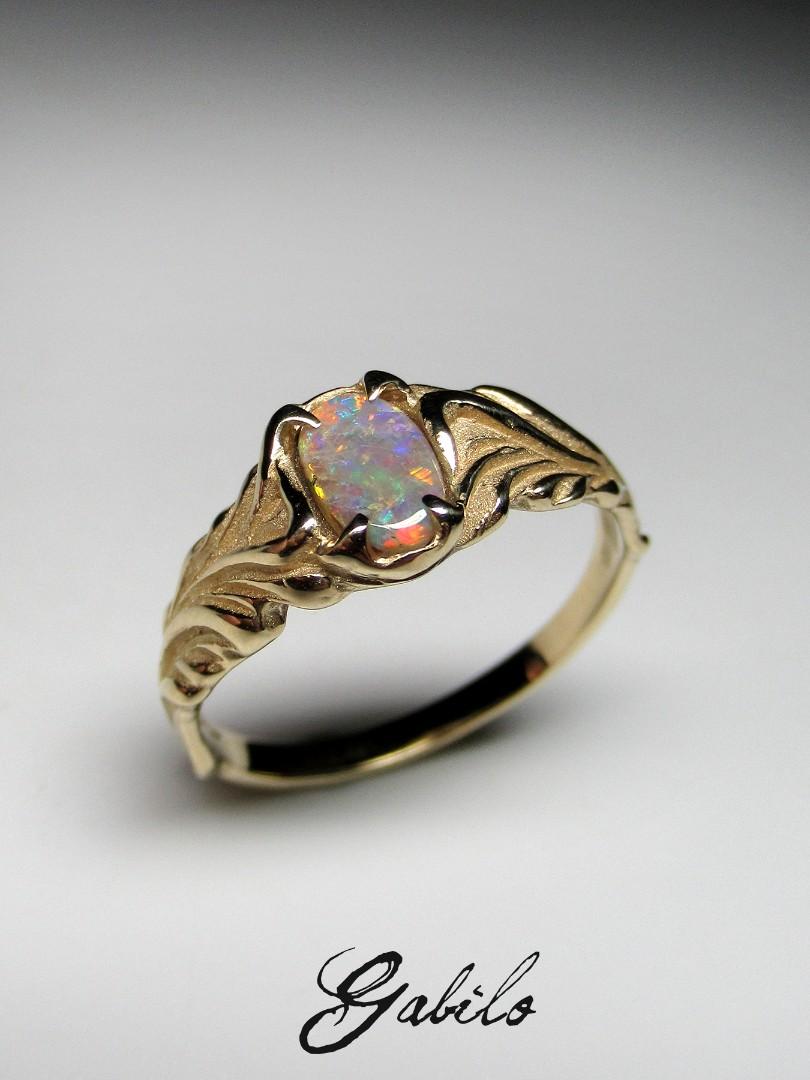 14K gold ring with natural bright Dark Opal

opal origin - Australia 

opal measurements - 0.79 x 0.16 x 0.28 in / 2 x 4 x 7 mm

stone weight - 0.30 carats

ring size - 7.25 US

ring weight - 2.42 grams
