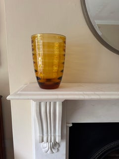 Dark orange handblown ribbed vase