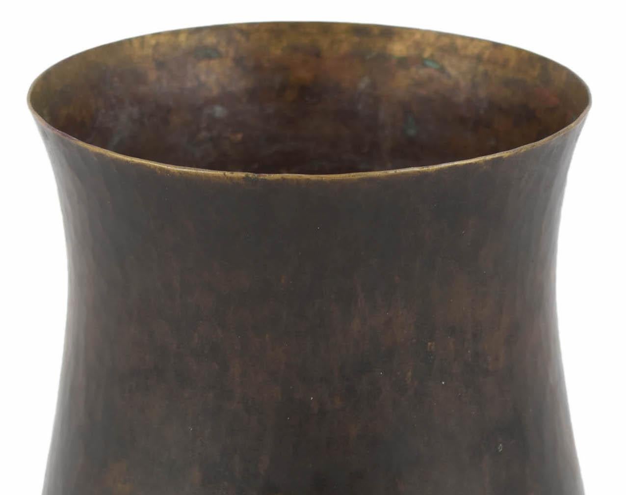 Dark patina brass vase is an original decorative work realized in the second third of the 20th century.

Original brass. 

Designed by Eugen Zint. 

Made in Germany. 

Good conditions: Slight signs of age.

Beautiful brass vase realized in