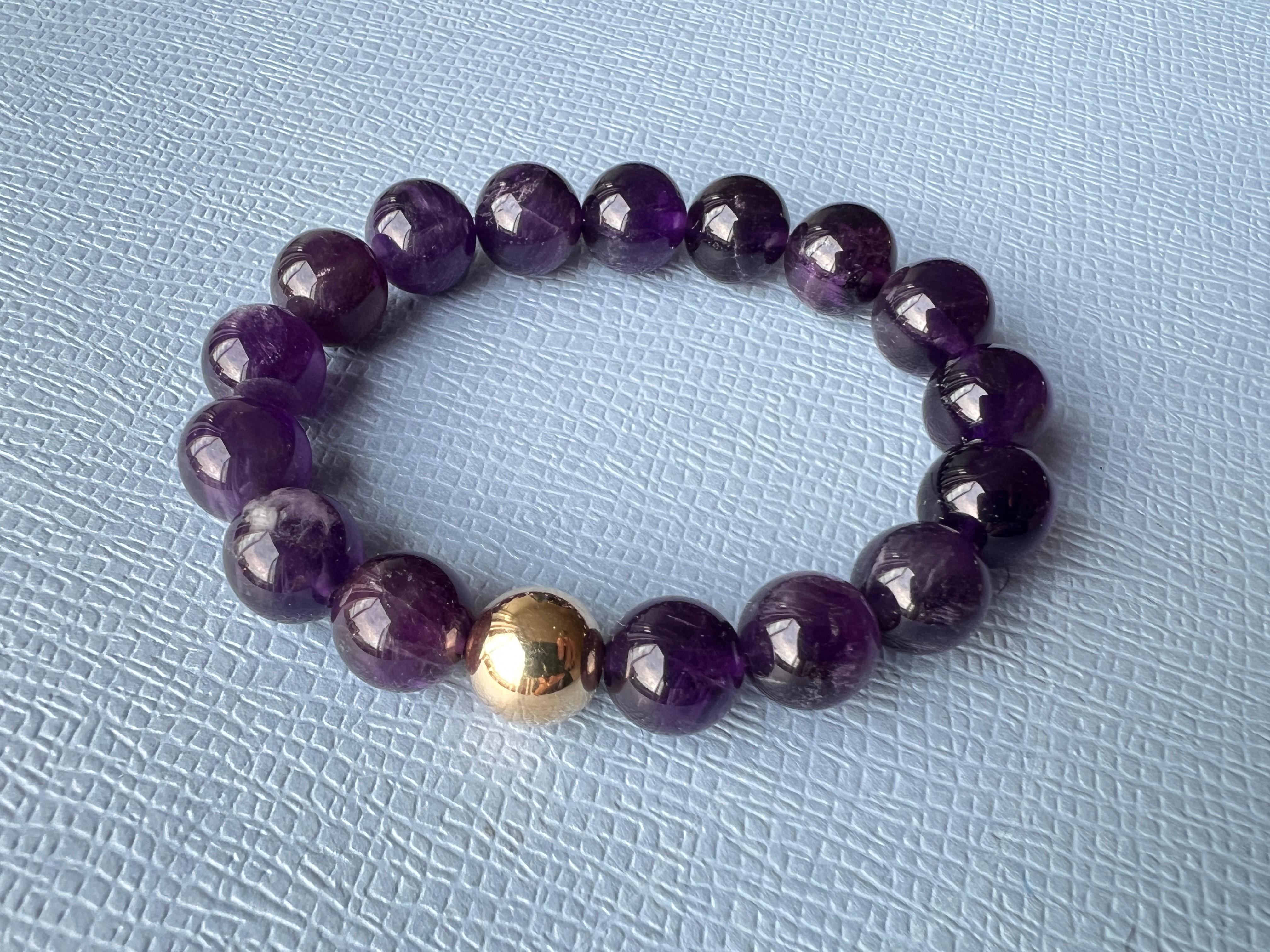 Dark Purple Amhetyst Semi Precious Bead Bracelet Gold Filled Unisex

Healing Properties:
Amethyst is renowned for its ability to promote physical and emotional healing. It is believed to have a soothing impact on the mind and emotions, helping to