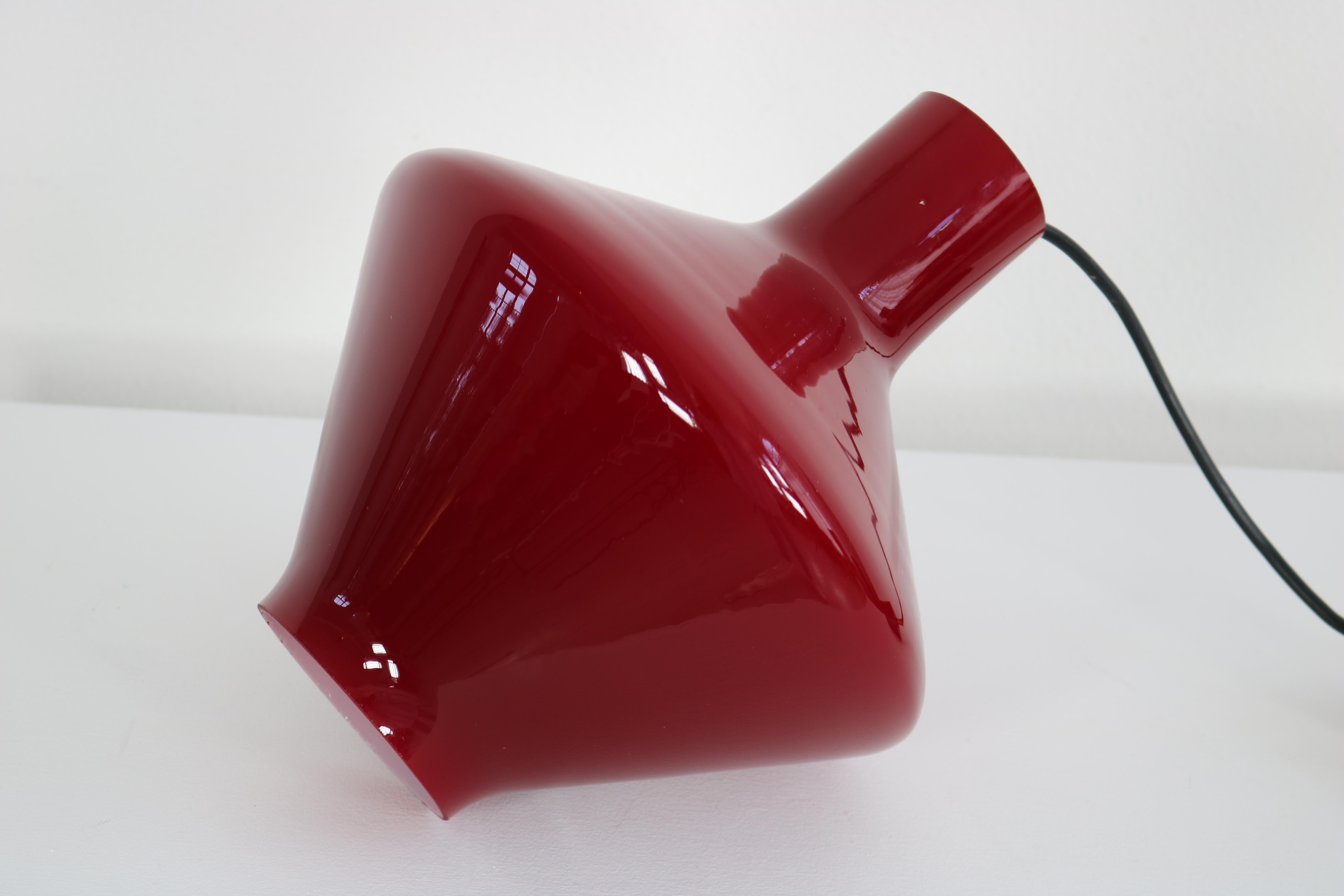 Italian pendant lamp made of red solid-coloured Murano glass. 1950s. 
Original condition