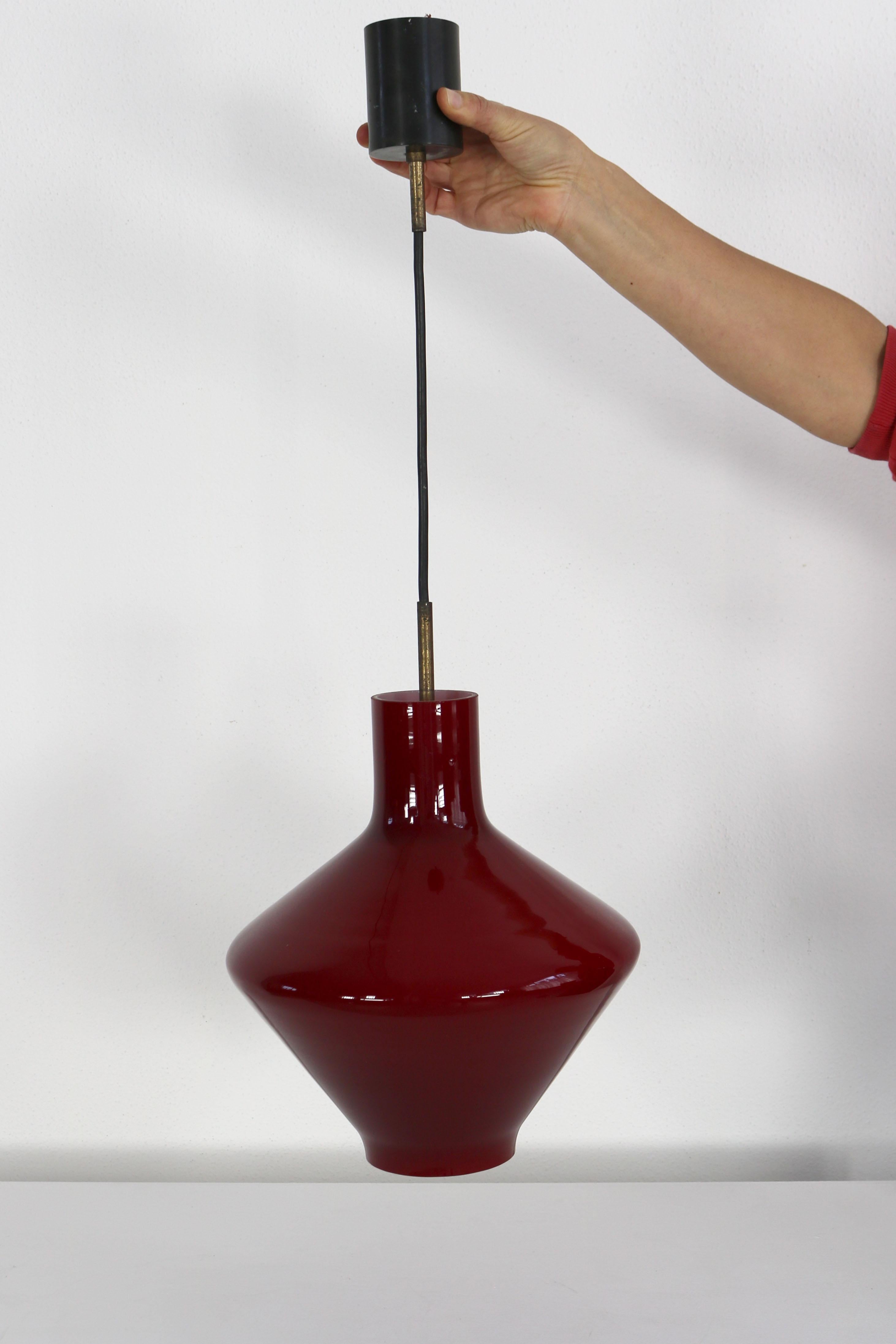 Italian Dark red Italien Murano glass pendant light from the 1950s. For Sale