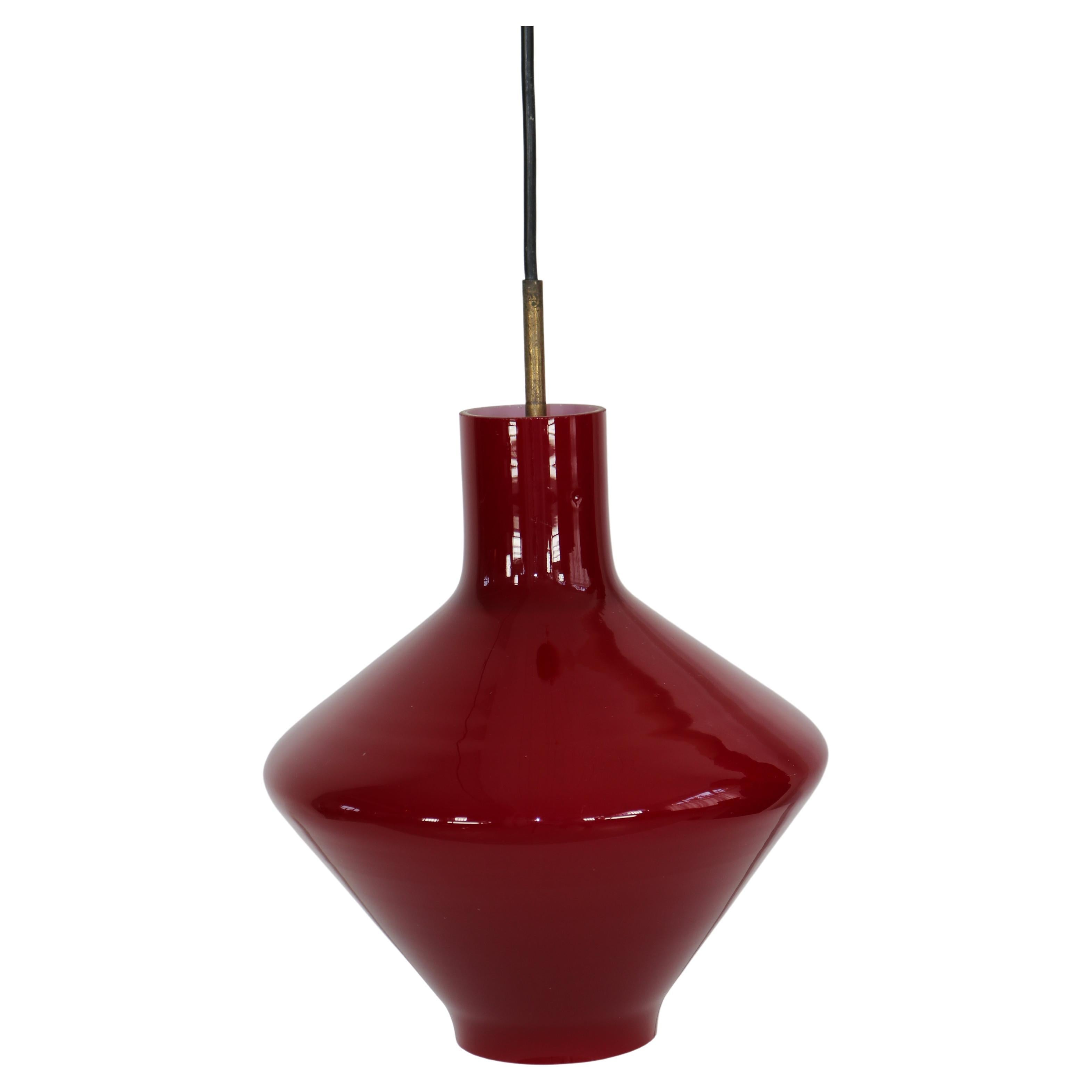 Dark red Italien Murano glass pendant light from the 1950s. For Sale