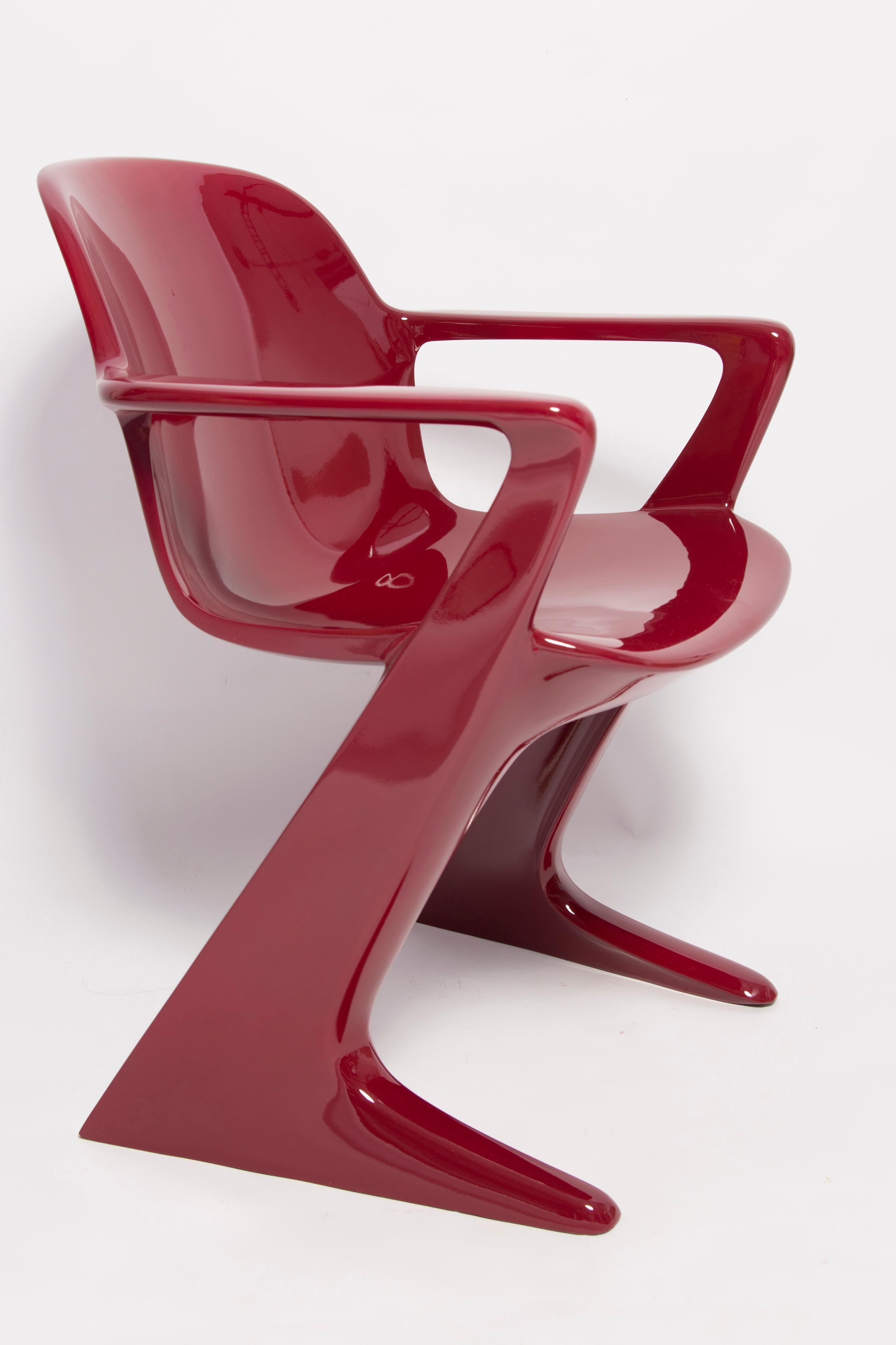 This model is called Z-chair. Designed in 1968 in the GDR by Ernst Moeckl and Siegfried Mehl, German Version of the Panton chair. Also called kangaroo chair or variopur chair. Produced in eastern Germany.

Chair is after full renovation, glossy