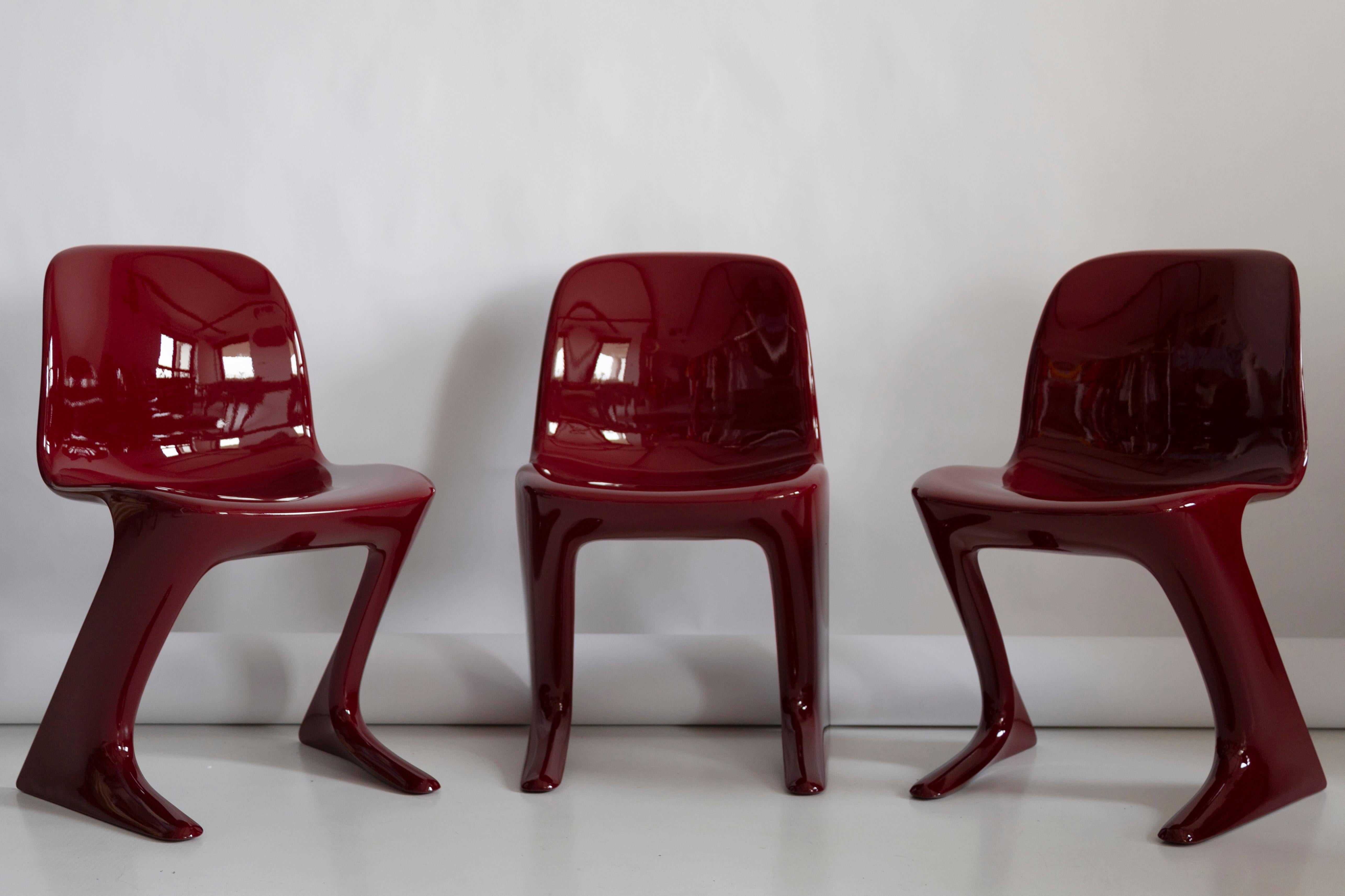 This model is called Z-chair. Designed in 1968 in the GDR by Ernst Moeckl and Siegfried Mehl, German Version of the Panton chair. Also called kangaroo chair or variopur chair. Produced in eastern Germany.

Chair is after full renovation, glossy red