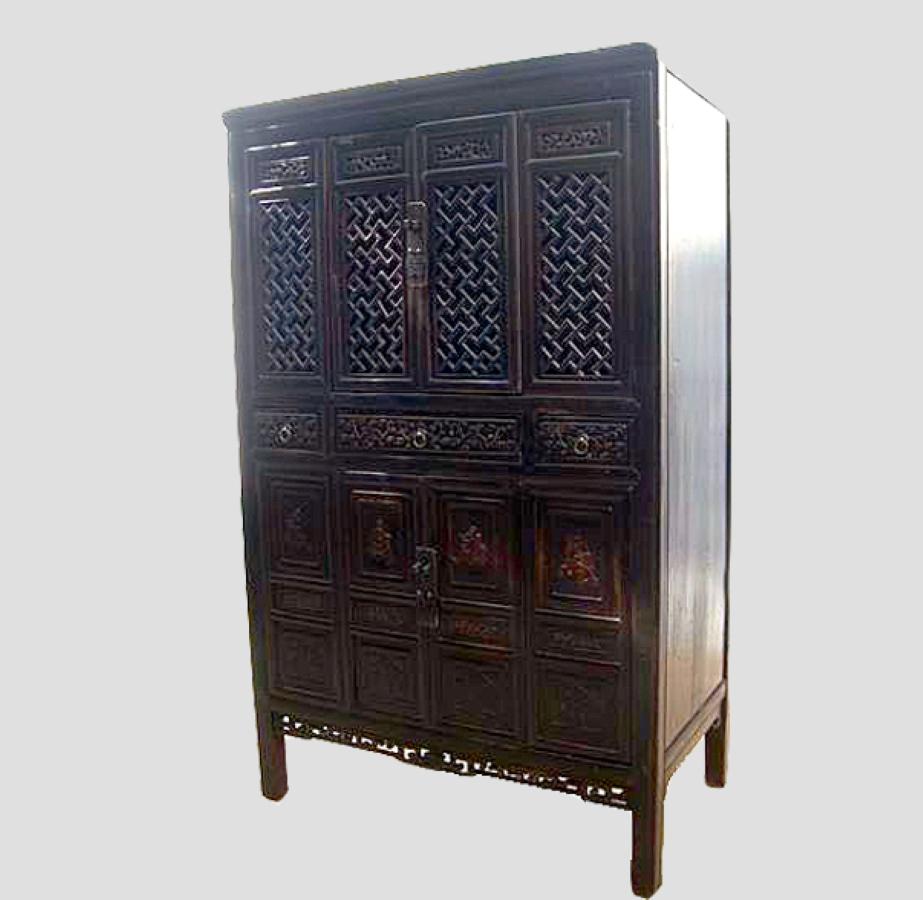 In old China, a kitchen cabinet was made as the one you see in the display. The top was for storing bowls, dishes and utensils. The bottom was for storing food. The doors were made like Chinese windowpanes with sliding doors, instead of solid wood,