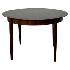 Dark Rosewood butterfly leaf dining table