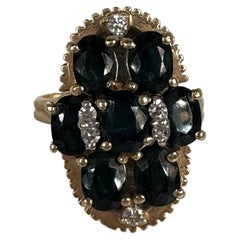 Dark sapphire & Diamond ring 14KT yellow gold