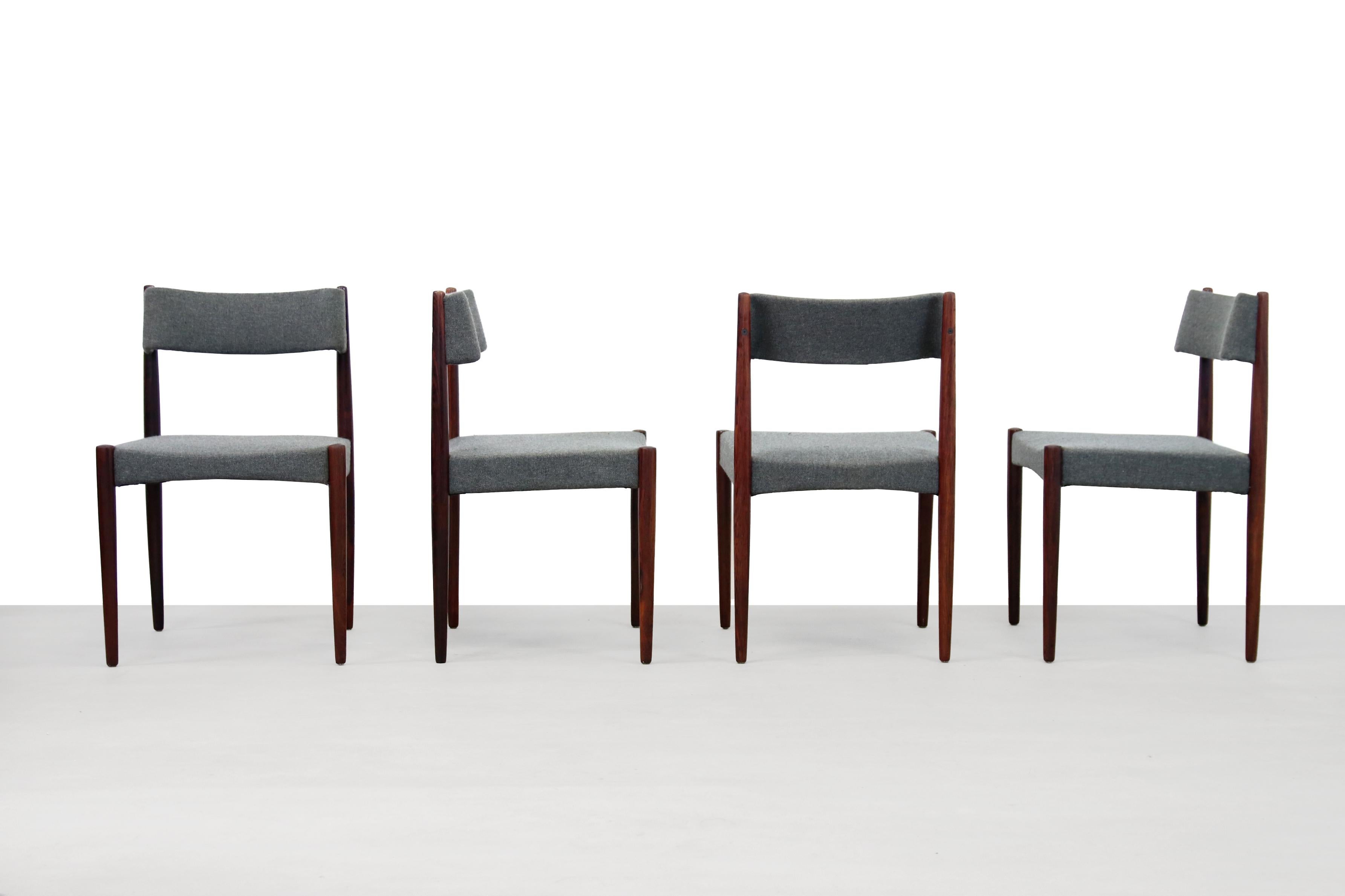 Very beautiful rosewood dining room chairs from Bovenkamp. Often attributed to Aksel Bender Madsen. The backrests are beautifully designed and give good support to the back. The chairs have been reupholstered in an anthracite gray wool furniture