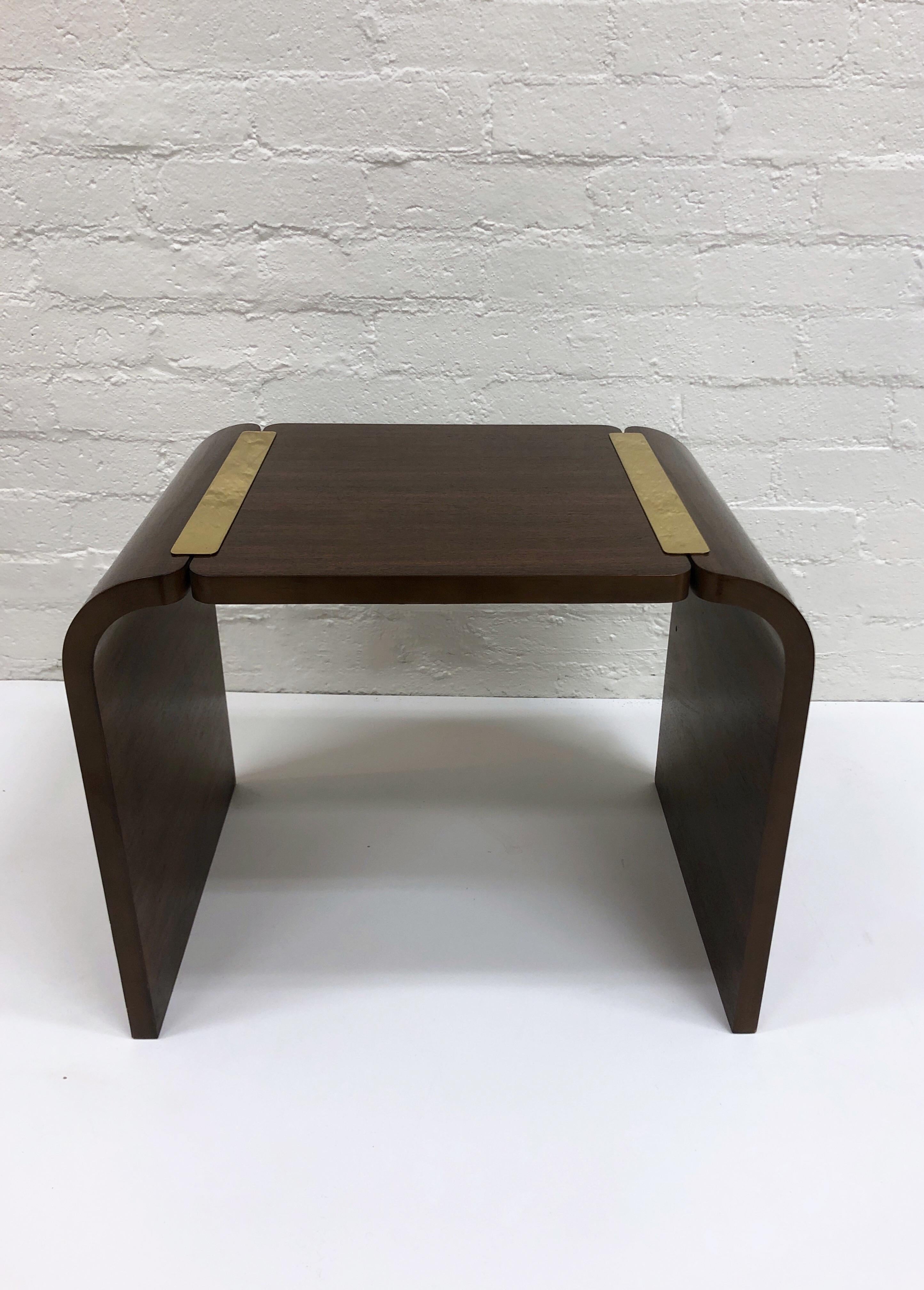 Dark walnut and polish brass Waterfall side table by Baker Furniture Co. Circa 1970’s. 
Original condition with minor wear consistent with age. 
Measurements: 27.75” Wide 20” Deep, 22” High.