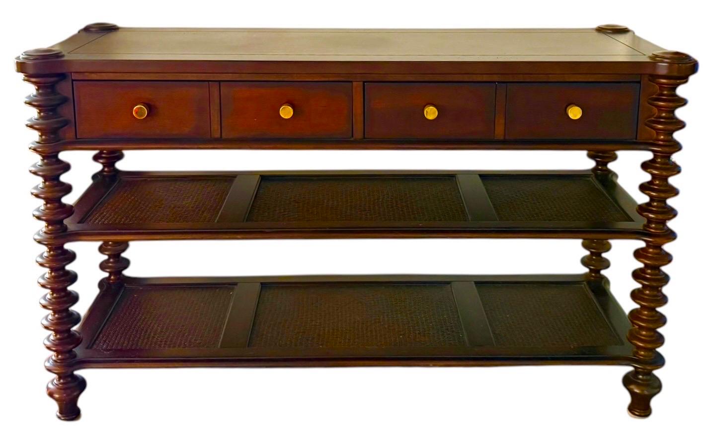 Elegant Georgian style console table with 2 drawers and 2 shelves. Brass knobs and spindle legs make for a classic and eye catching piece for an entryway, hallway, sofa table, or dining room.