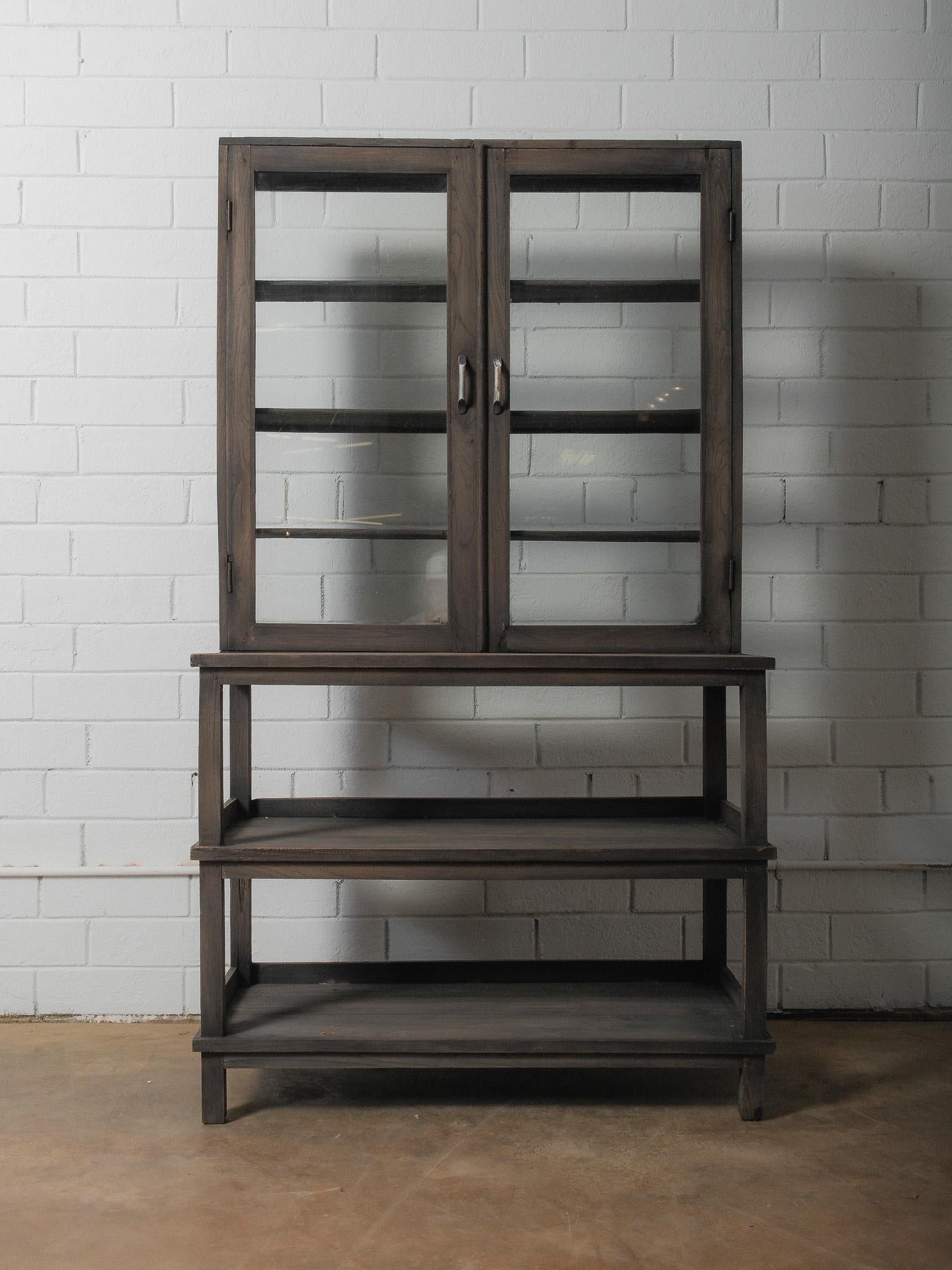 Brass Dark Wood Glass-Front Cabinet on Tiered Open Base For Sale