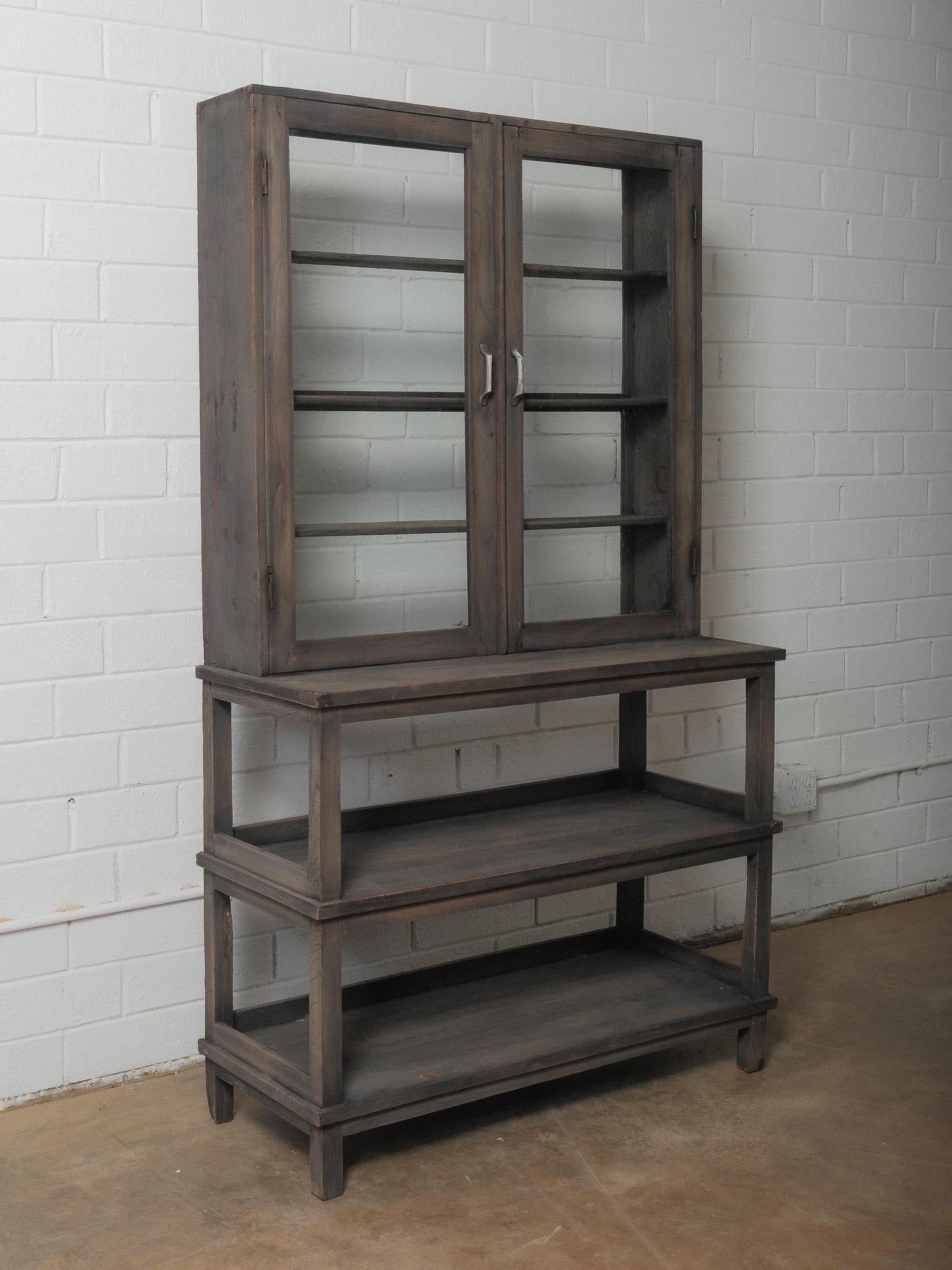 Dark Wood Glass-Front Cabinet on Tiered Open Base For Sale 1