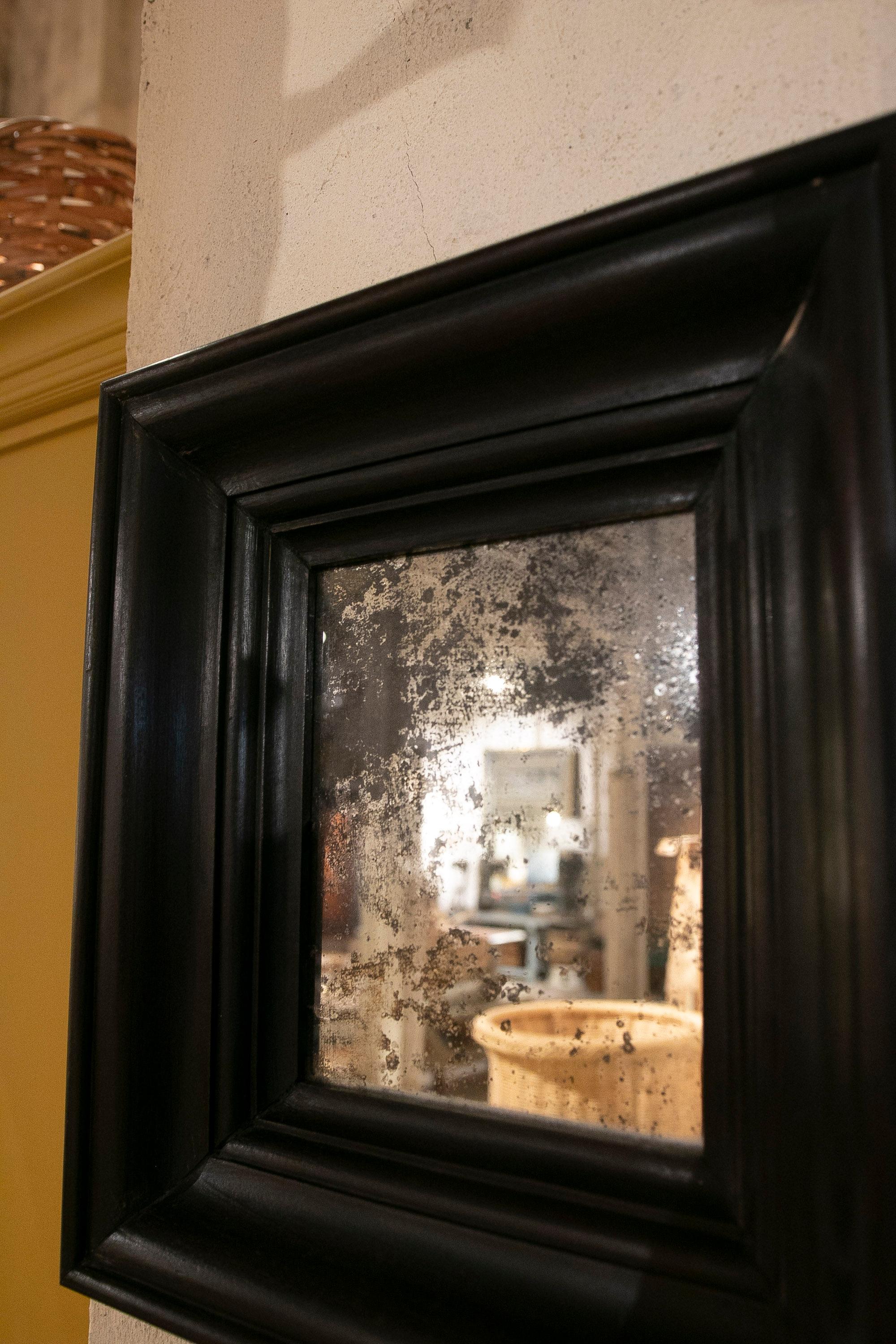 Espejo de madera oscura con espejo envejecido Vidrio