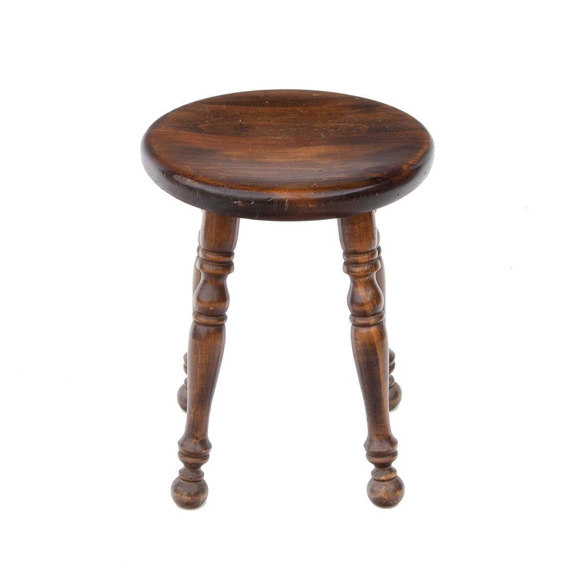 USA, 1960s
Solid dark wooden stool with turned legs. Nice detail to this accent piece. Use as additional seating, accent, or as a step. Pictured with chair to show scale. Stamped Ethan Allen.
CONDITION NOTES: In good condition with light age