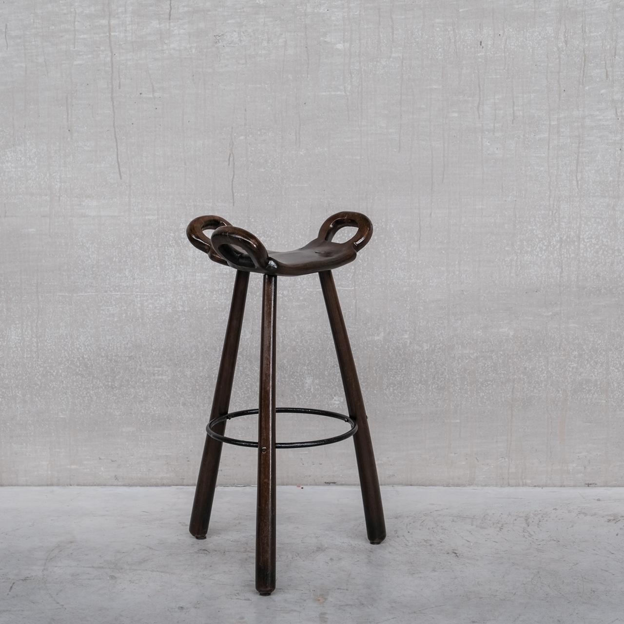 A set of up to six mid-century wooden and iron bar stools. 

A darker version to others we have listed. 

Spain, c1970s. 

Likely by Confonorm, Spain. Often attributed to Sergio Rodrigues and Carl Malmsten.

Good vintage condition. Some