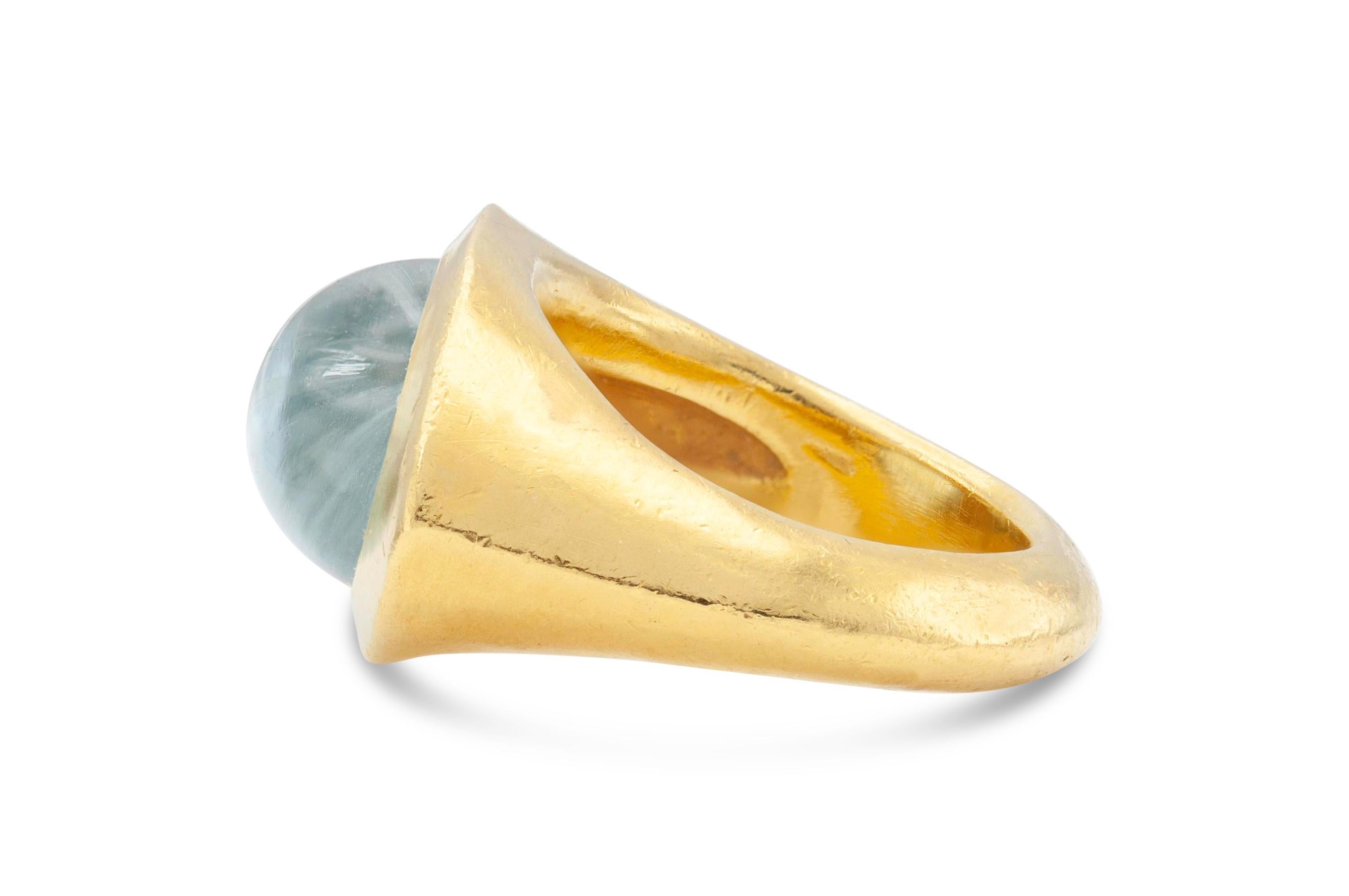 Finely crafted in 22K yellow gold with a cabochon Aquamarine.
Signed by Darlene de Sedle.