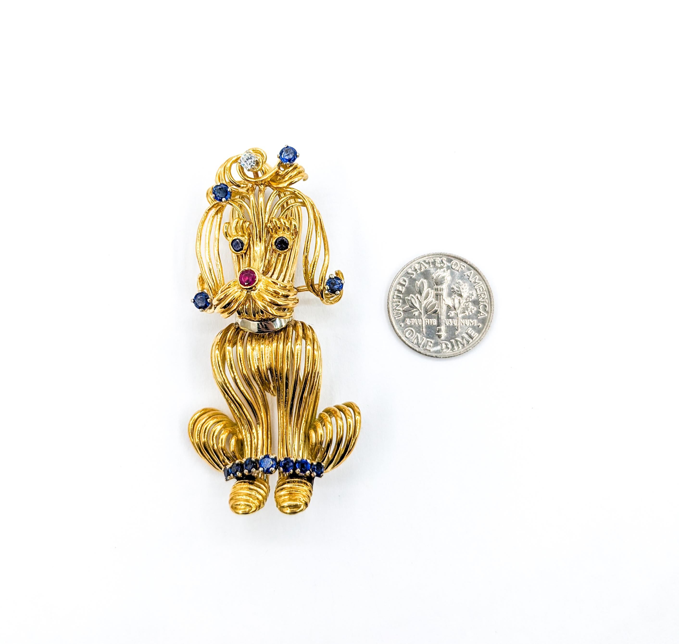 Darling Mid-Century Poodle Dog Brooch with Sapphires, Ruby & Diamonds in 18K Gold

Fall in love with this whimsical Vintage Poodle Brooch, meticulously designed in 18 karat yellow gold spaghetti style wire with gemstone details. Atop the Poodle's