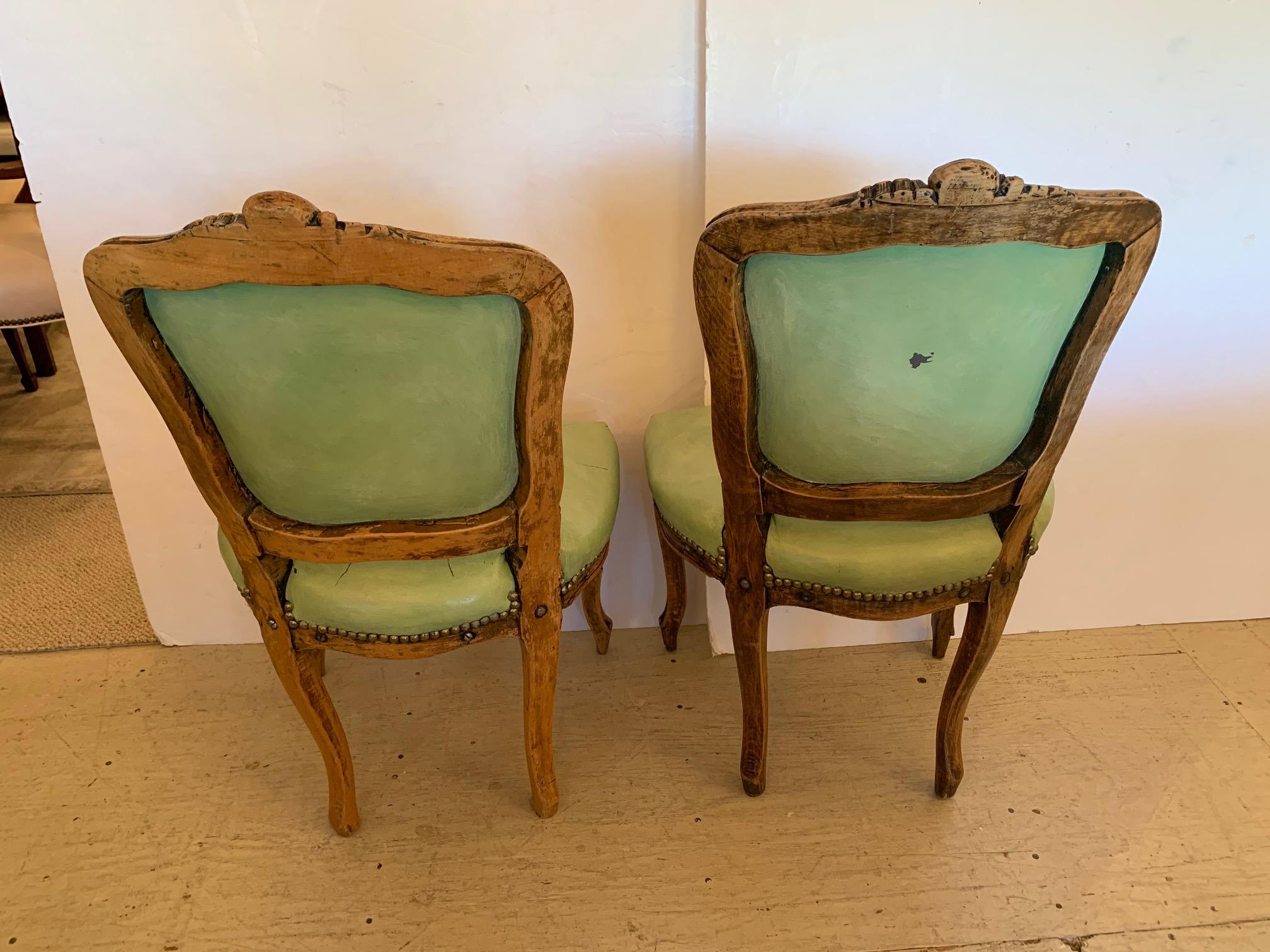 Darling Pair of French Antique Light Green Leather Carved Walnut Side Chairs For Sale 8