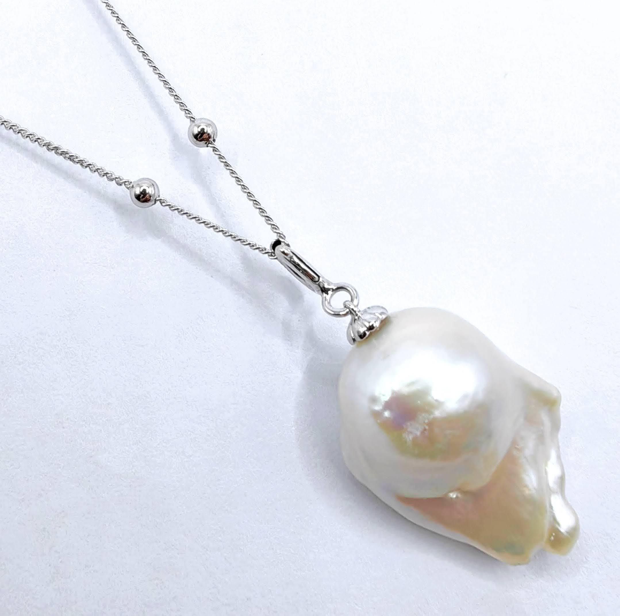 Contemporary Darling Phantom: Black Diamond Baroque Pearl Ghost Charm Pendant 18K White Gold For Sale