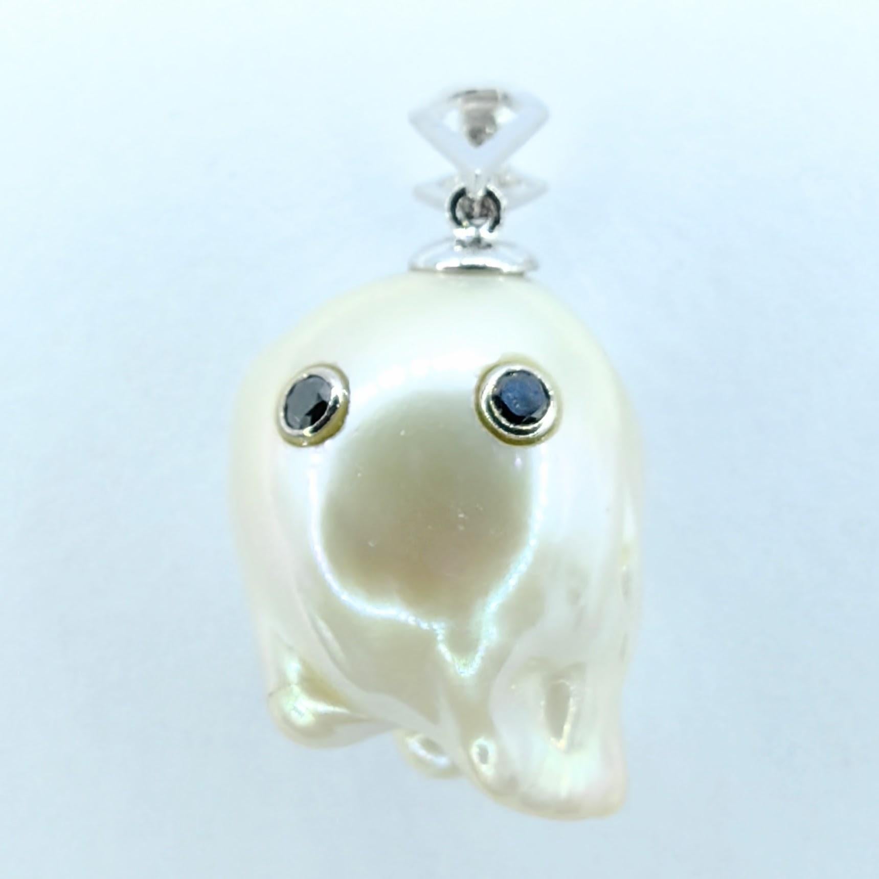 Unveil the enchanting Darling Phantom: a whimsical marvel featuring a Black Diamond accented Baroque Pearl set in 18K White Gold, evoking the spirit of a friendly ghost. This adorable piece, with a pendant length of approximately 1.02 inches