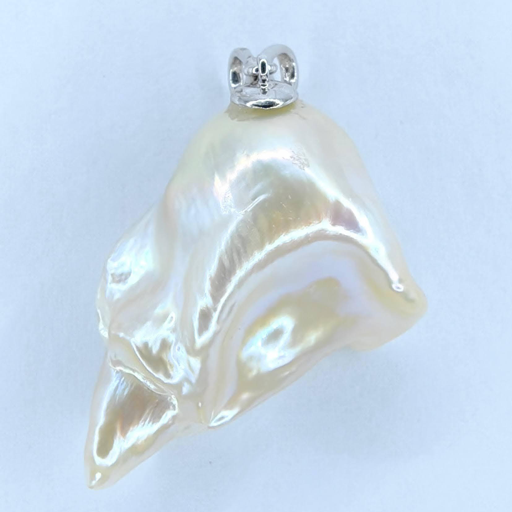 Contemporary Darling Phantom: Ruby and White Baroque Pearl Ghost Pendant in 18K White Gold